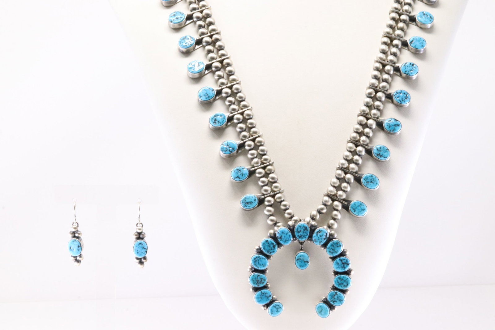 Native America Navajo Sterling Silver Kingman Turquoise Squash Necklace & Earring's Set By T.Smith.: This is a Native America Navajo Sterling Silver Kingman Turquoise Squash Necklace & Earring's Set By T.Smith. Necklace length: 30.00" Total weight: 154.20 Grams.