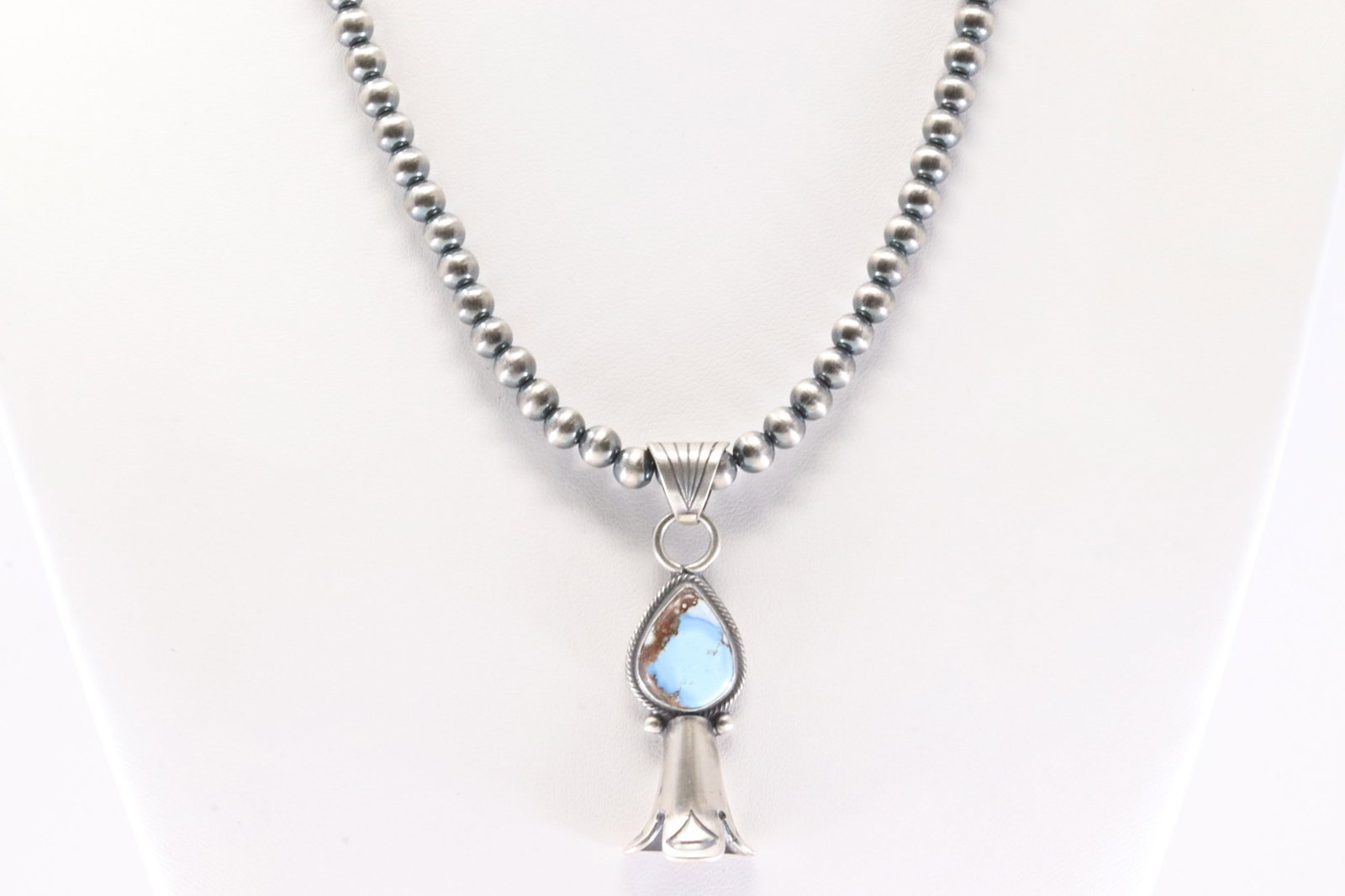 Native America Navajo Sterling Silver Golden Hill Turquoise Blossom Pendant By Sharon McCarthy. With: This is a Native America Navajo Sterling Silver Golden Hill Turquoise Blossom Pendant By Sharon McCarthy. Stamp From R.B Company. With Pearl Beaded Sterling Silver Machine Made Necklace. Necklace leng