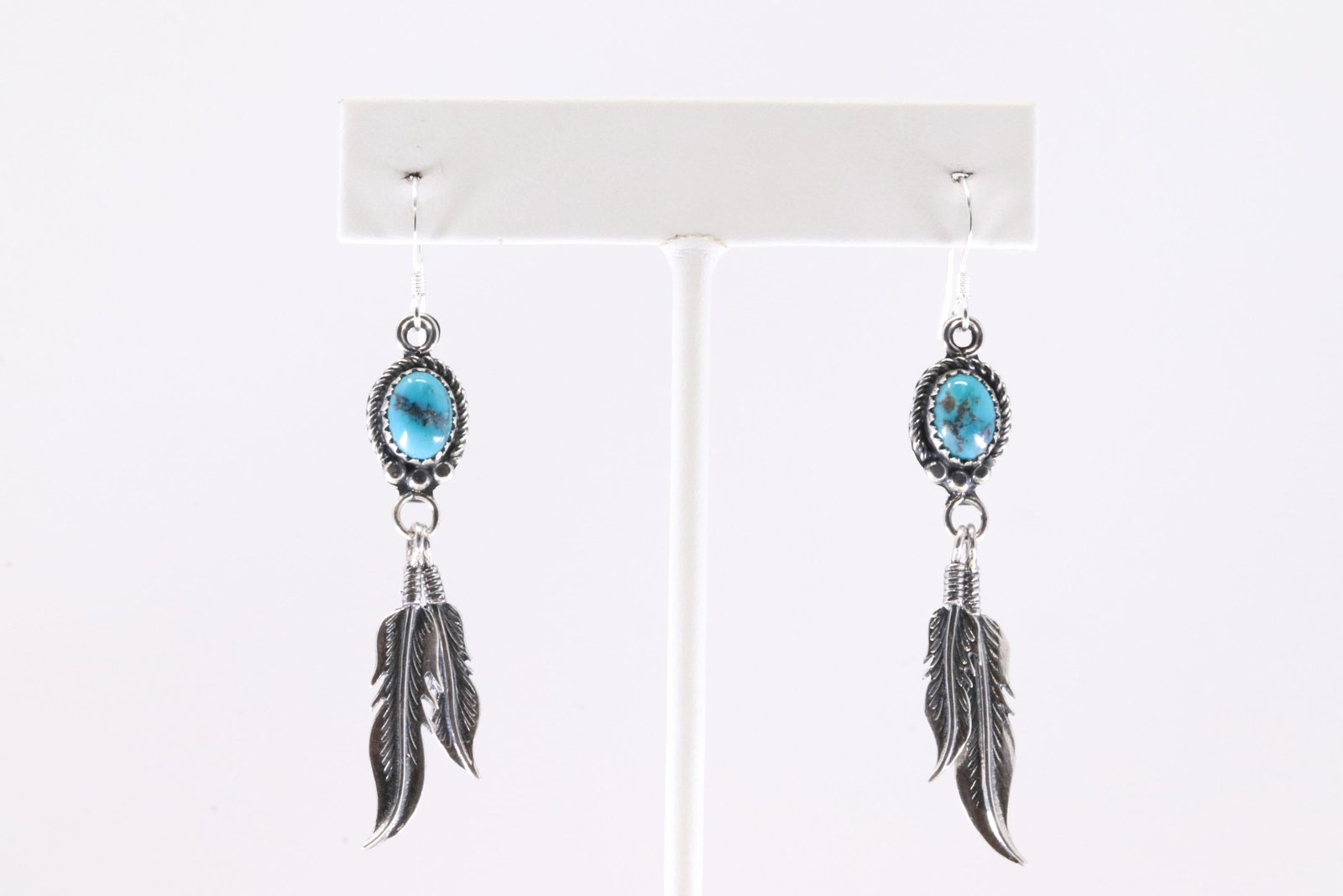 America Sterling Silver Turquoise Feather Dangling Earring's.: This is a America Sterling Silver Turquoise Feather Dangling Earring's.