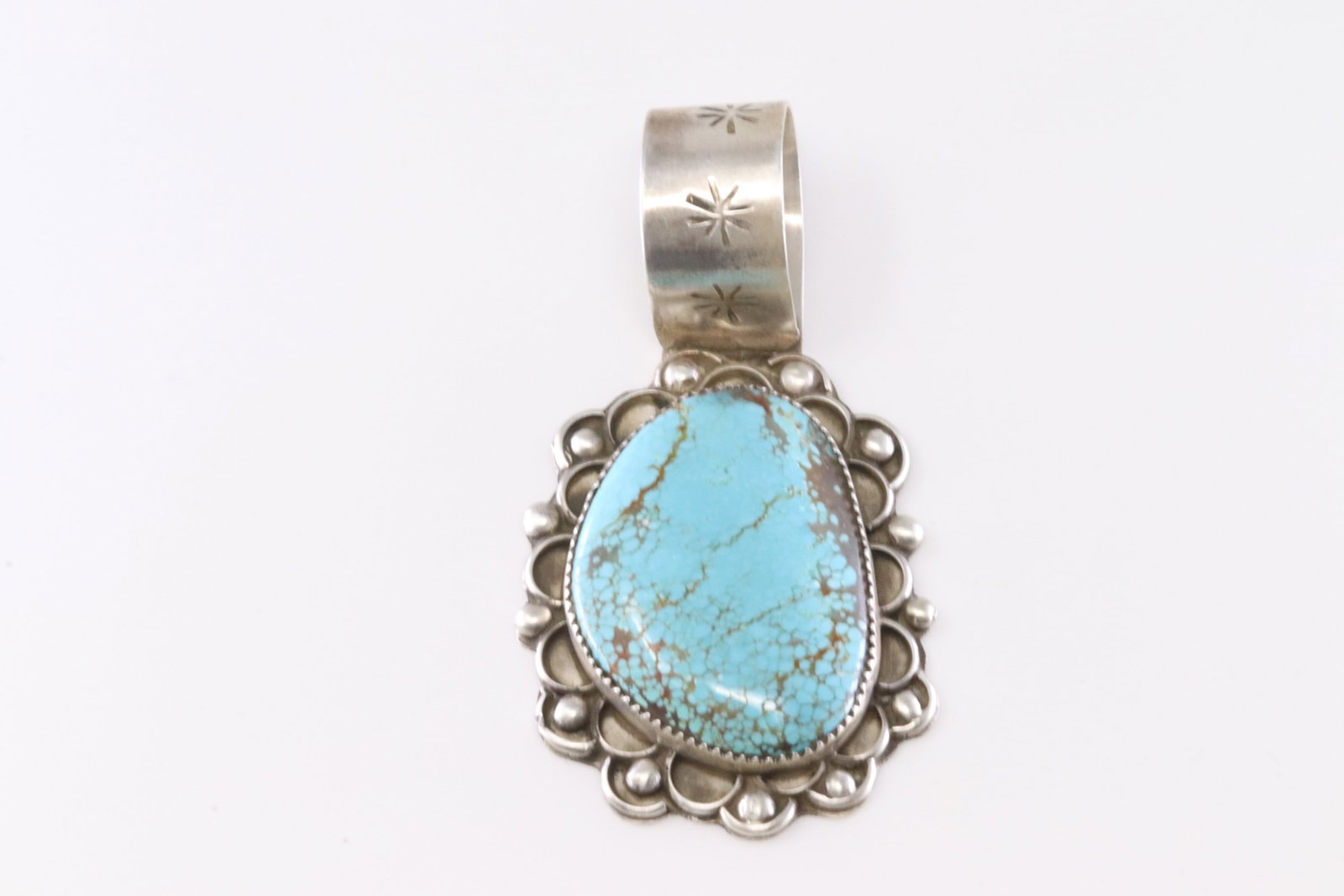 Native America Navajo Sterling Silver Turquoise Pendant By Virginio Hino.: This is a Native America Navajo Sterling Silver Turquoise Pendant By Virginio Hino.