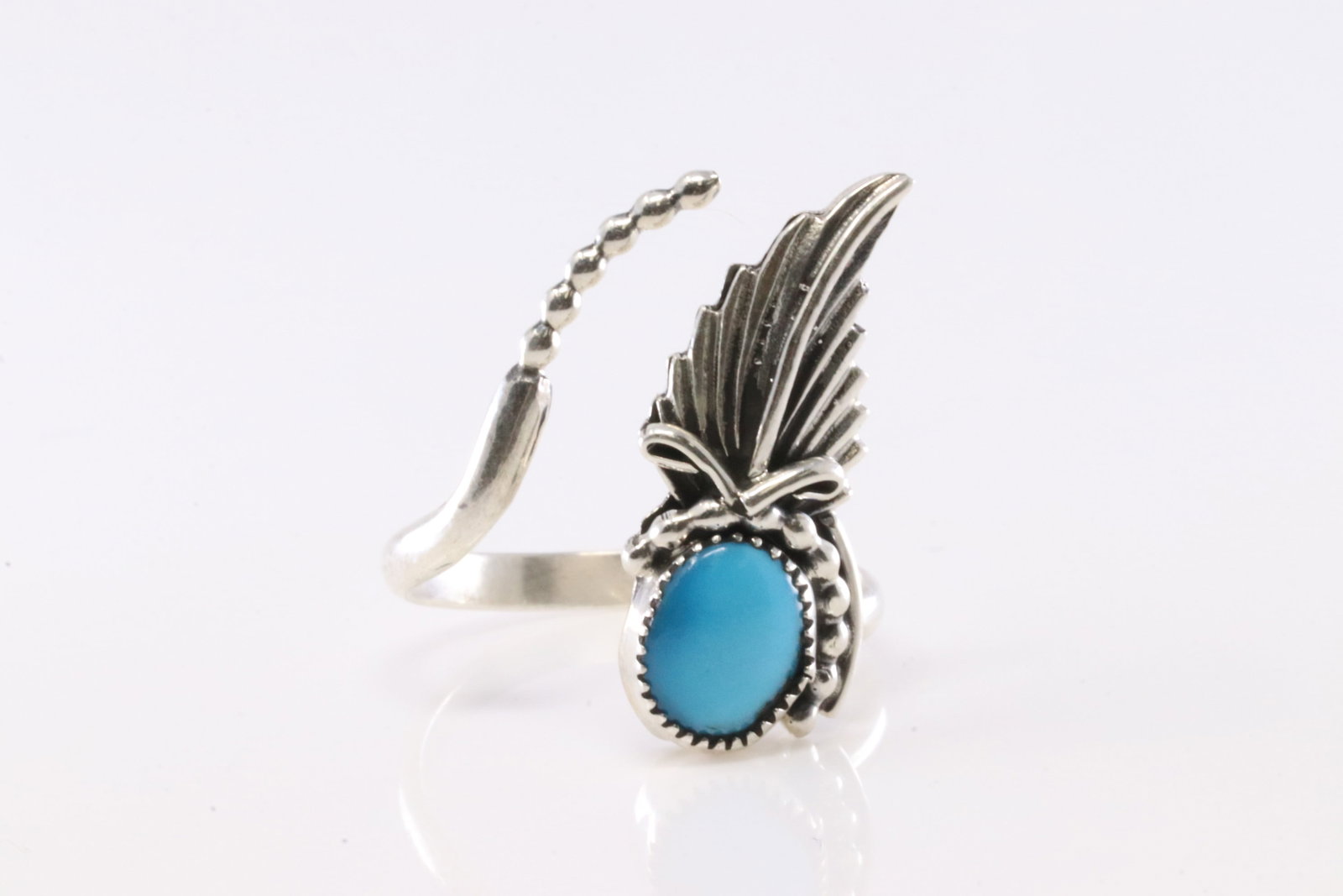 Native America Navajo Sterling Silver Turquoise Feather Ring By Jennifer Cayaditto.: This is a Native America Navajo Sterling Silver Turquoise Feather Ring By Jennifer Cayaditto. Stamp By R.B Company. Ring Size: 6.50.