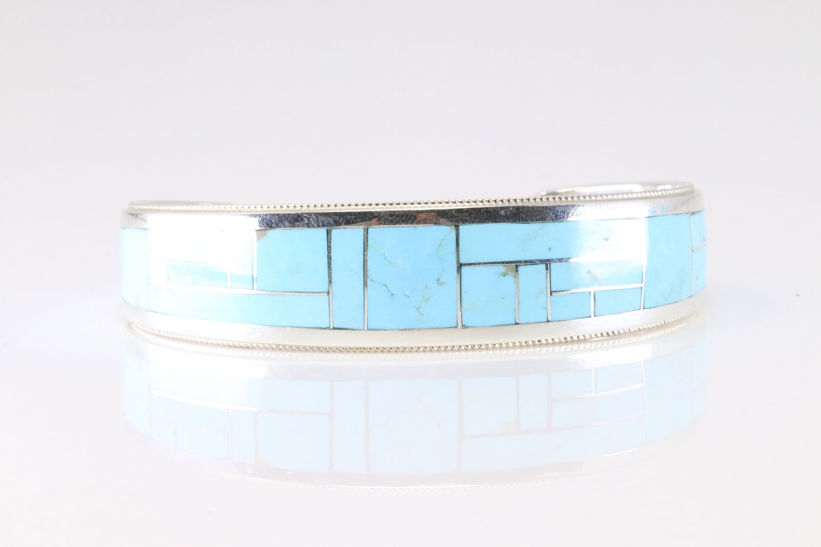 Native America Zuni Sterling Silver Turquoise Inlay Bracelet Cuff By RGB.: This is a Native America Zuni Sterling Silver Turquoise Inlay Bracelet Cuff By RGB. Stamp RGB.
