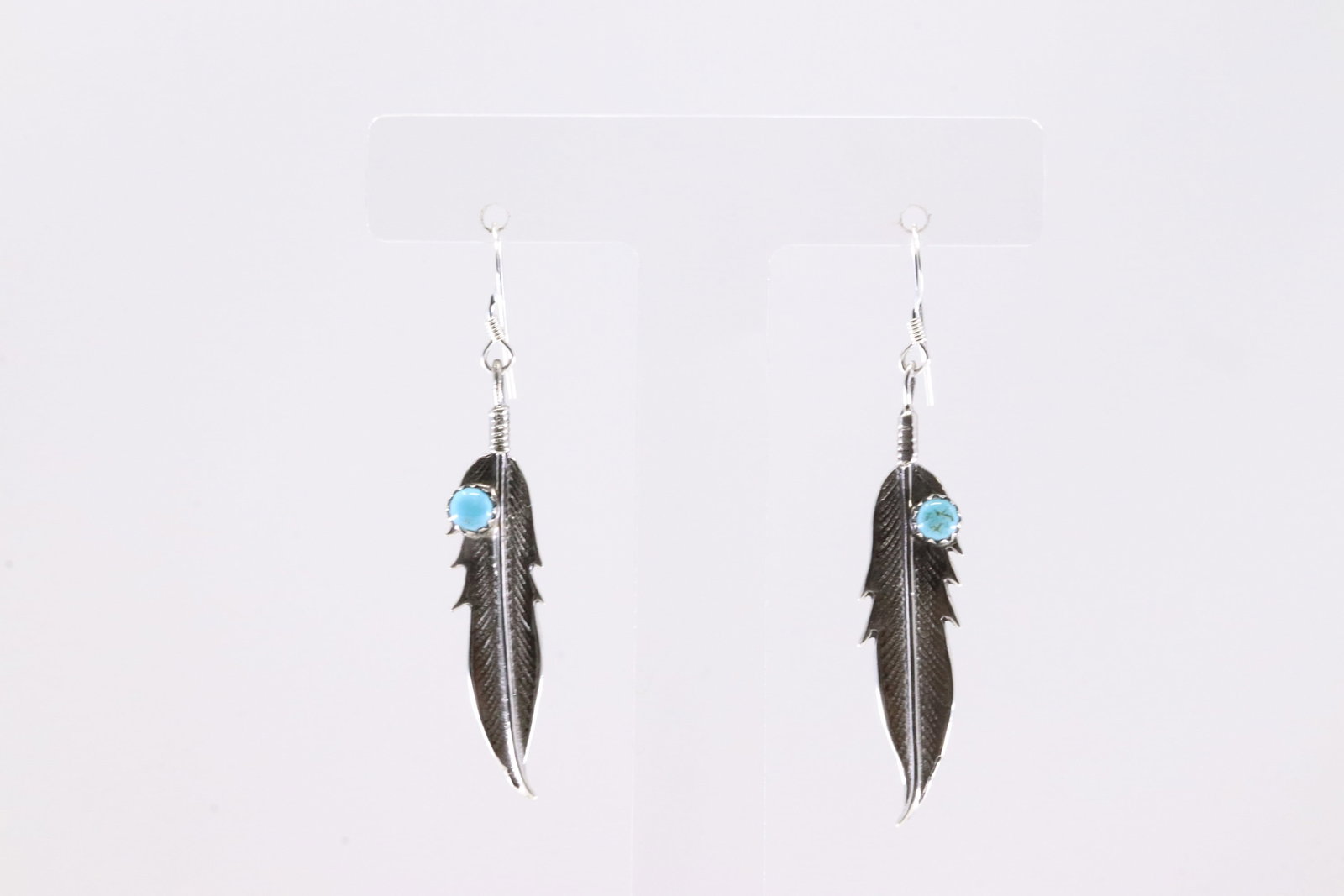 America Sterling Silver Turquoise Feather Dangling Earring's.: This is a America Sterling Silver Turquoise Feather Dangling Earring's.