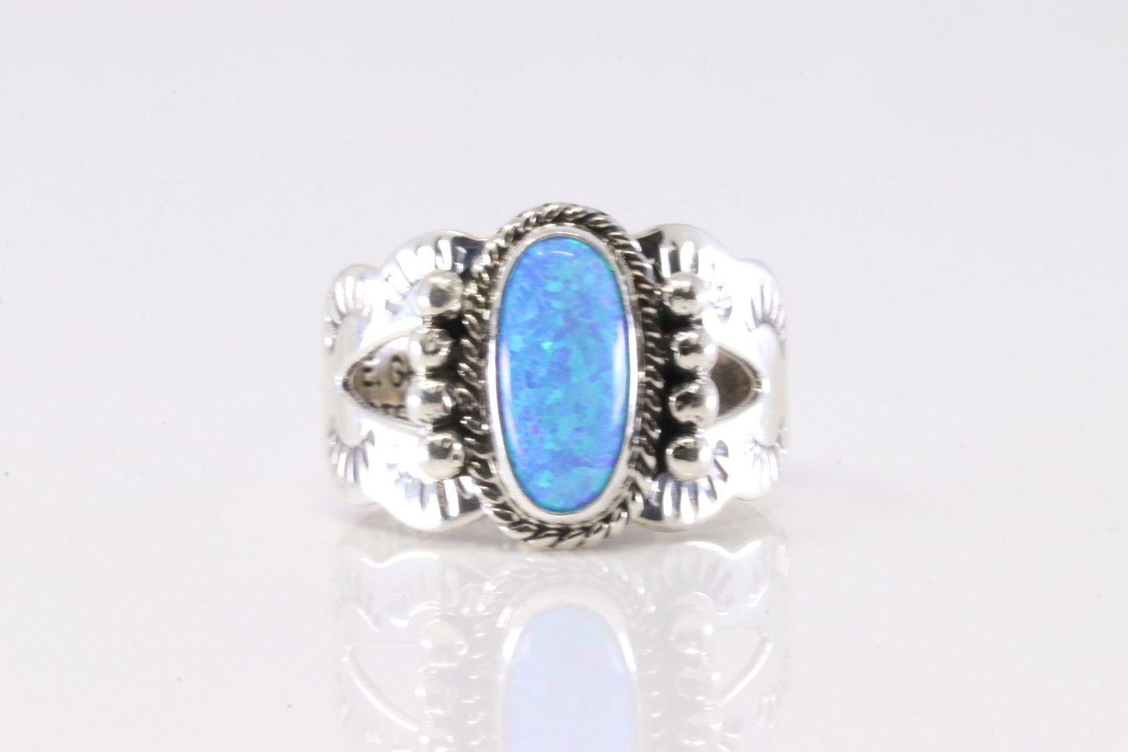 Native America Navajo Sterling Silver Blue Opal Ring By E. Gruber.: This is a Native America Navajo Sterling Silver Blue Opal Ring By E. Gruber. Stamp E. Gruber. Ring Size: 9.00.