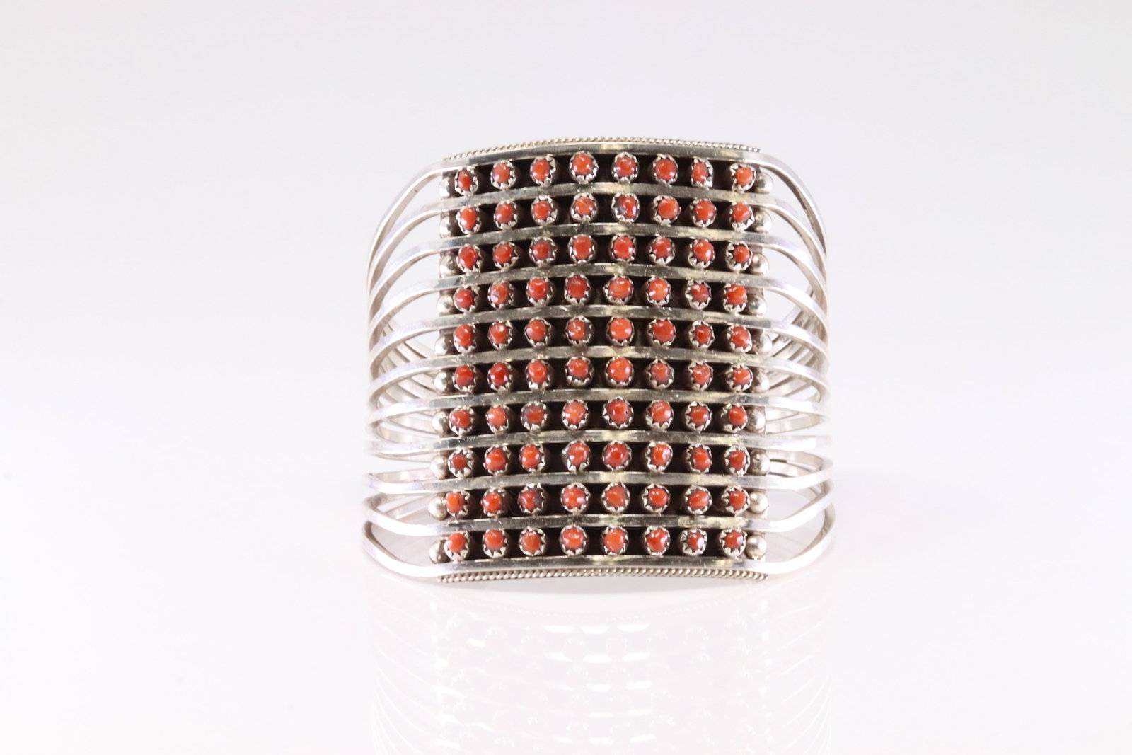 Native America Zuni Sterling Silver 10 Rows Coral Bracelet Cuff By S.L.: This is a Native America Zuni Sterling Silver 10 Rows Coral Bracelet Cuff By S.L.