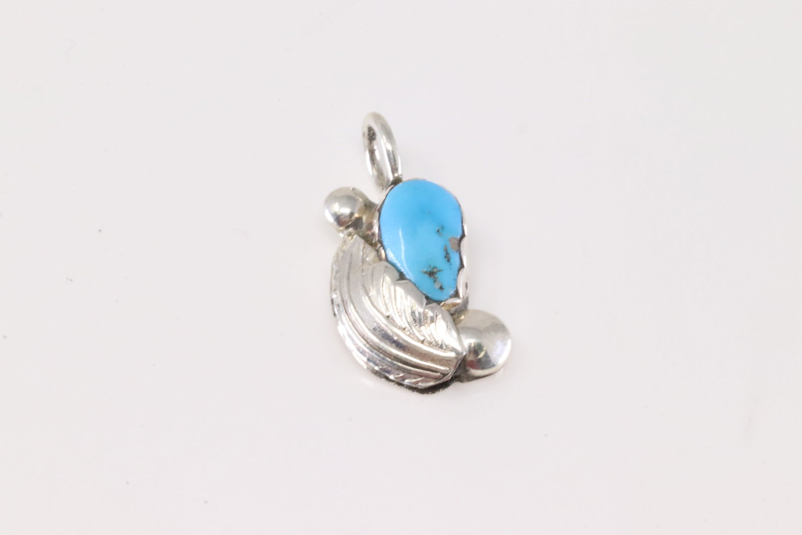 Native America Navajo Sterling Silver Turquoise Feather Pendant By Simplicio.: This is a Native America Navajo Sterling Silver Turquoise Feather Pendant By Simplicio. Stamp Simplicio.
