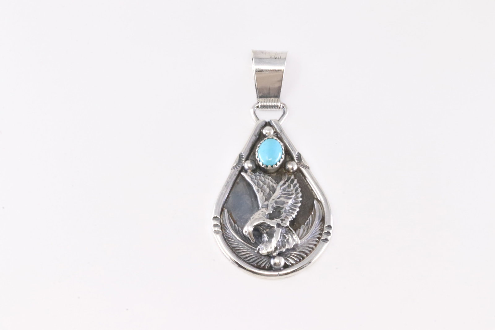 Native America Navajo Sterling Silver Turquoise Eagle Pendant By Darrell Morgan.: This is a Native America Navajo Sterling Silver Turquoise Eagle Pendant By Darrell Morgan. Stamp DM.