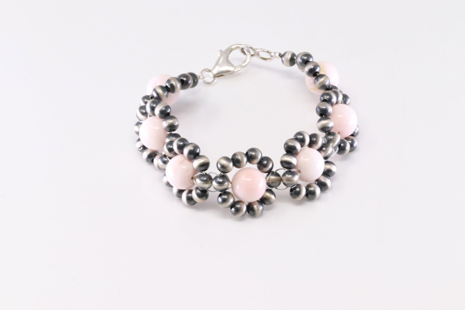 America Sterling Silver Pink Conch Shell &? Pearl Beaded Bracelet Link.: This is a America Sterling Silver Pink Conch Shell &? Pearl Beaded Bracelet Link. Bracelet length: 8.00"