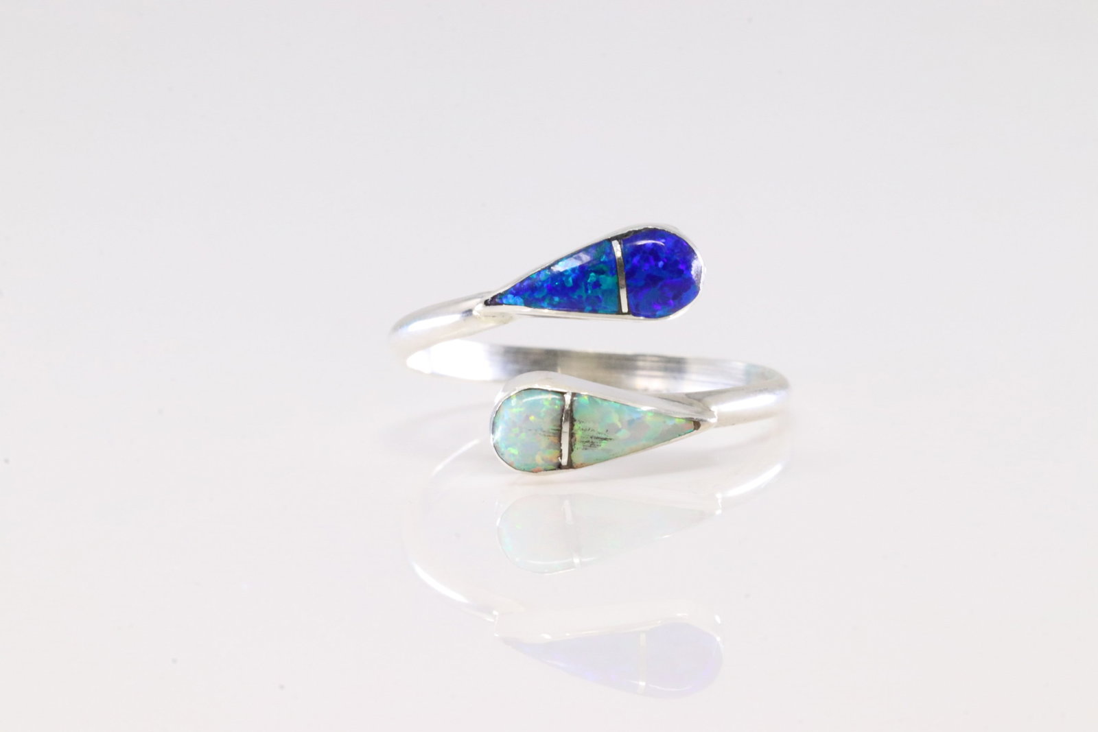 Native America Zuni Sterling Silver Blue & White Opal Ring By R.V.N.: This is a Native America Zuni Sterling Silver Blue & White Opal Ring By R.V.N. Ring size: 8.00.