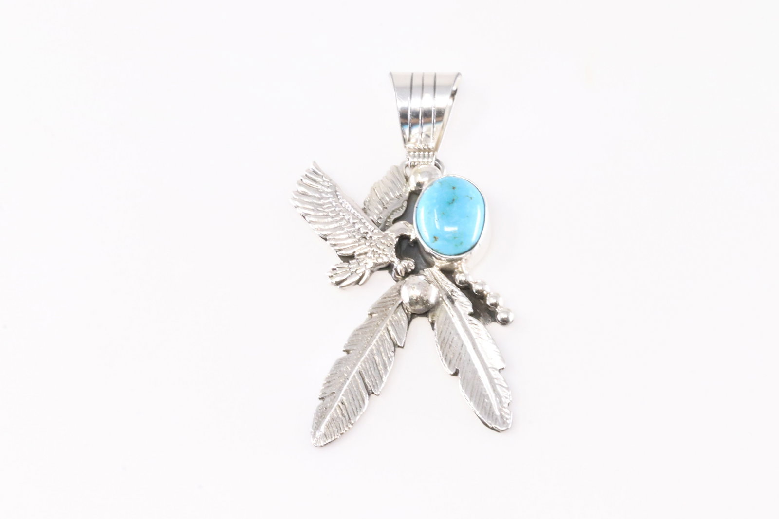 America Sterling Silver Turquoise Thunderbird Pendant.: This is a America Sterling Silver Turquoise Thunderbird Pendant.
