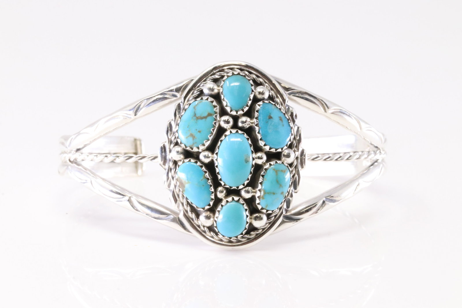 Native America Navajo Sterling Silver Kingman Turquoise Bracelet Cuff By Melvin Chee.: This is a Native America Navajo Sterling Silver Kingman Turquoise Bracelet Cuff By Melvin Chee. Stamp M Chee.