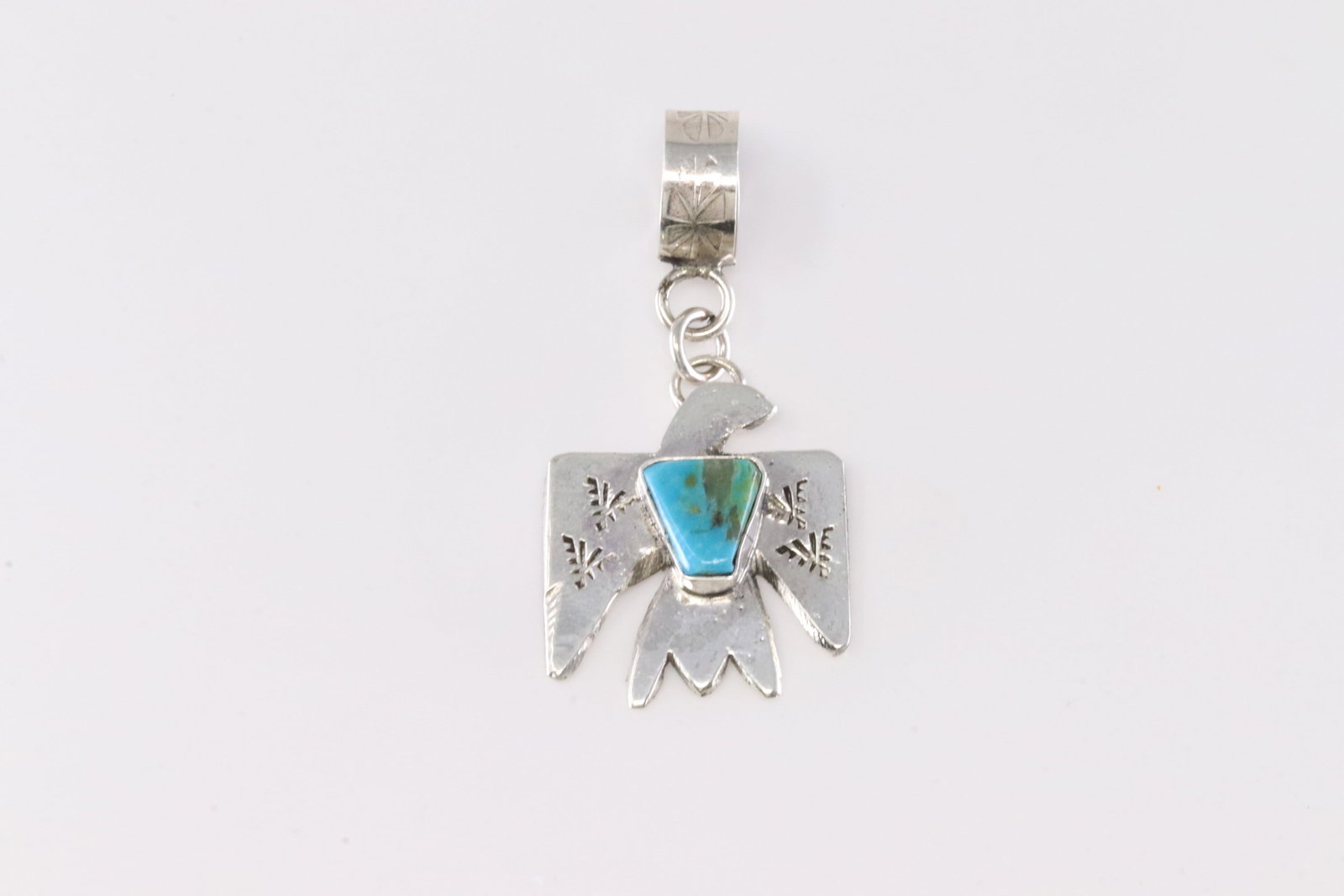 Native America Zuni Sterling Silver Turquoise Thunderbird Pendant By Jude Candelaria.: This is a Native America Zuni Sterling Silver Turquoise Thunderbird Pendant By Jude Candelaria. Stamp Jude Candelaria.