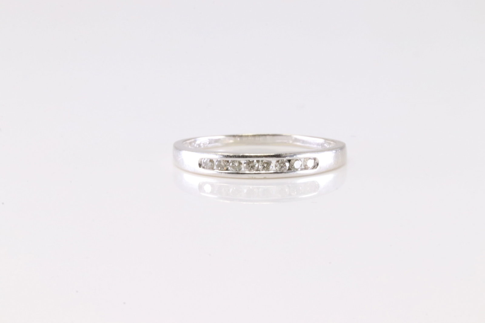 Diamond Ring 14Kt.: Ladies 14Kt White Gold Diamond Ring. This Charming Ring has 8 Sparkling Diamonds. Ring size: 8.00.