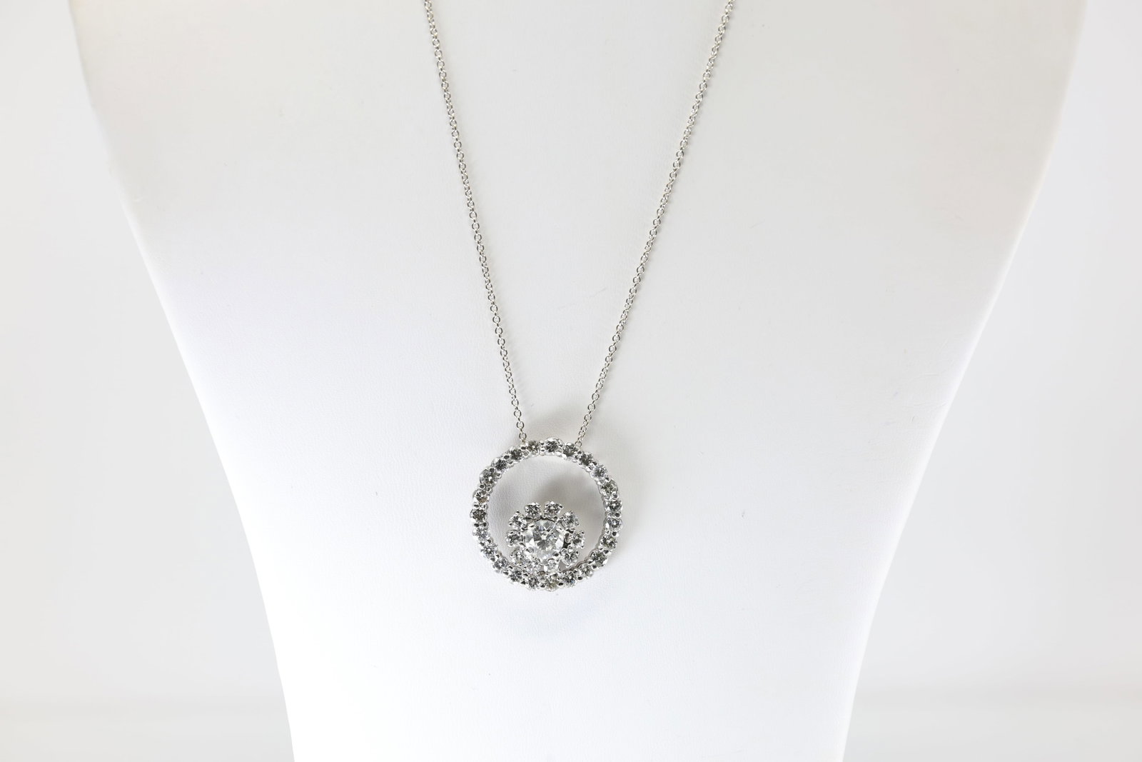 Diamond Pendent / Necklace 18Kt.: Ladies 18Kt White Gold Diamond Pendent / Necklace. This Necklace has Charming Pendent With 34 Round Briiliant Diamonds. Diamond Weight Approx: 5.00 ctw Necklace Lenght: 18.00. Total Weight: 13.12