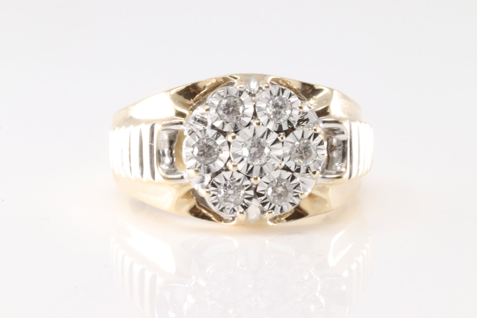Diamond Floral Ring 14Kt.: Men 14Kt Yellow Gold Diamond Floral Ring. This ring band has a floral deisgn with 7 round diamonds. Diamonds weight approx: Ring size: 12.25. Total weight: 7.80 Grams.