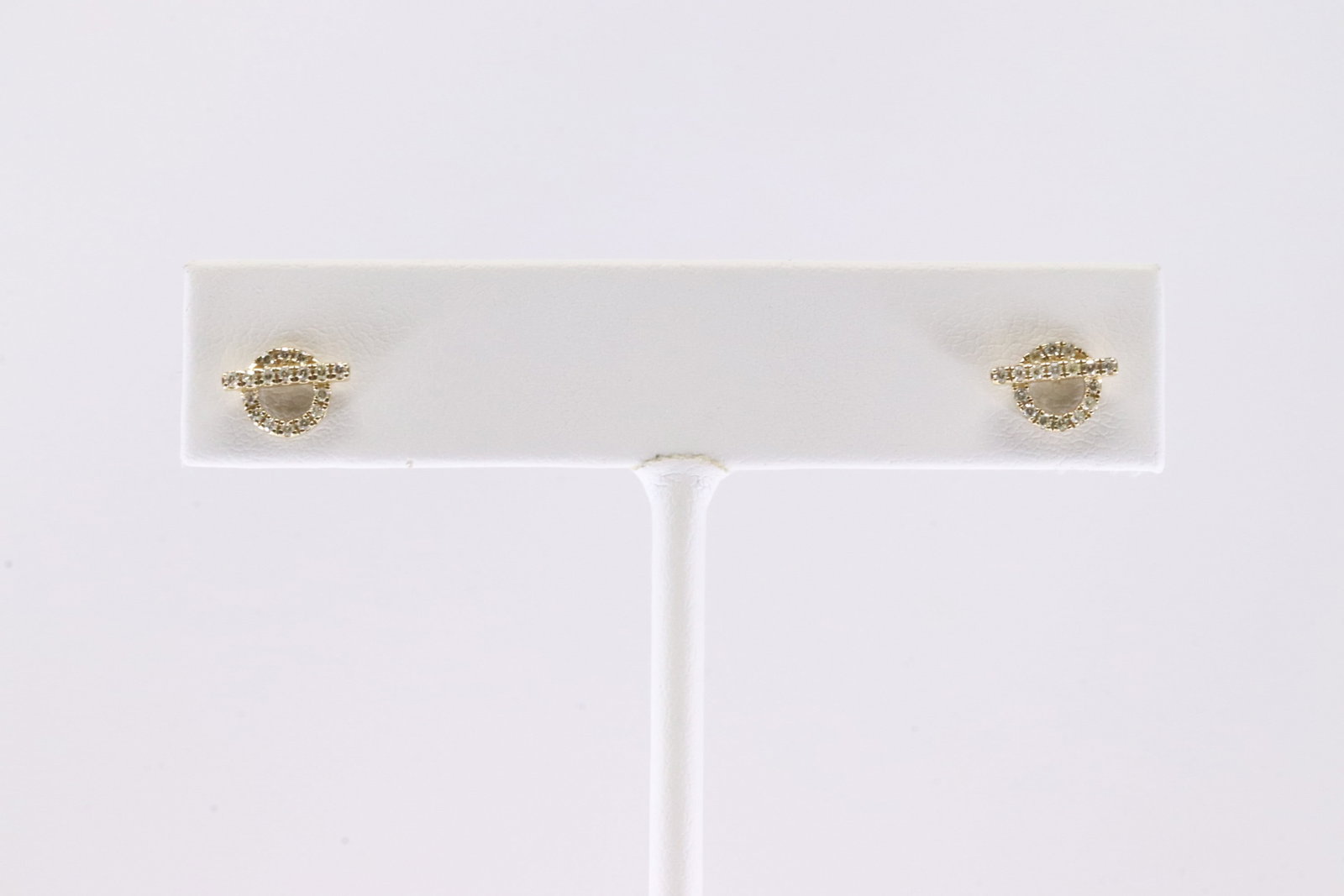 Diamond Stud Earring 10KT.: Ladies 10Kt Yellow Gold Diamond Stud Earring. This Beautiful Earring has 34 Round Sparkling Diamonds. Diamond Approx Weight: 0.16ctw.