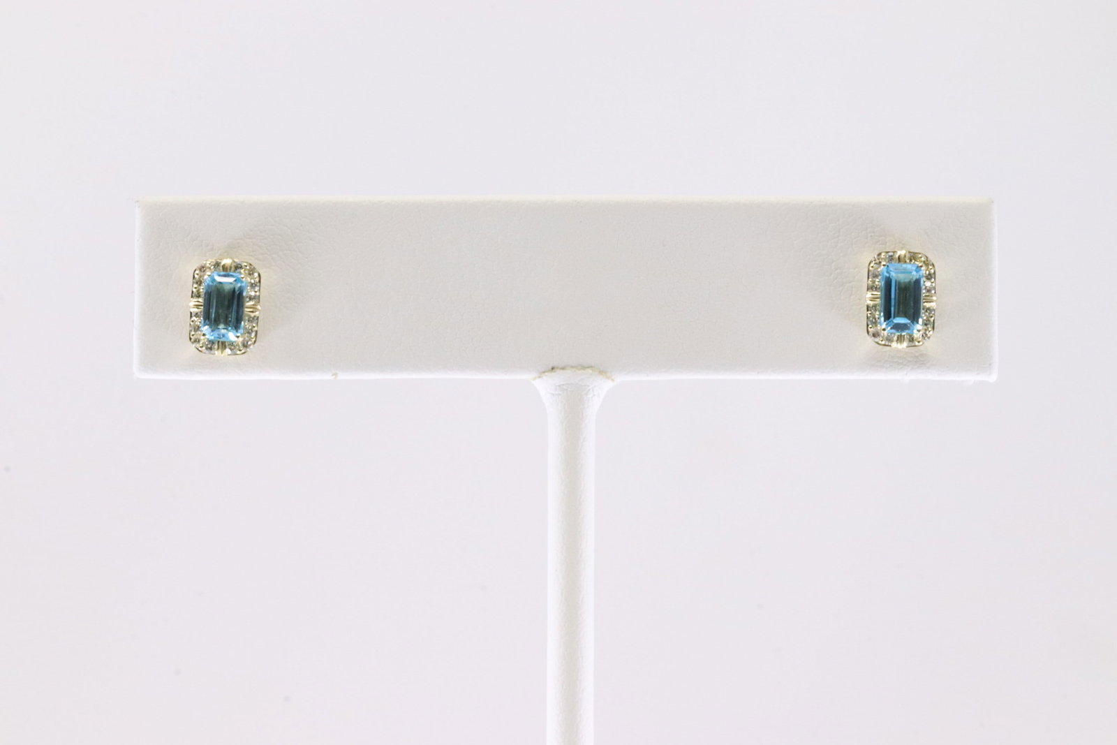 Blue Topaz & Diamond Stud Earring 10Kt.: Ladies 10Kt Yellow Gold Blue Toapz & Diamond Stud Earring. This Gorgeous Earring has Blue Topaz Gemstones & 24 Round Sparkling Diamonds. Diamond Approx Weight: 0.15ctw.