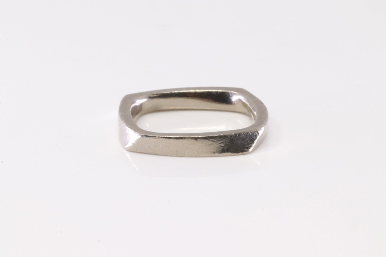 Tiffany & Co Ring 18Kt.: 18Kt White Gold Tiffany & Co Ring. This Charming Ring has Torque Design. Ring size: 6.50. Total weight: 6.55 Grams.