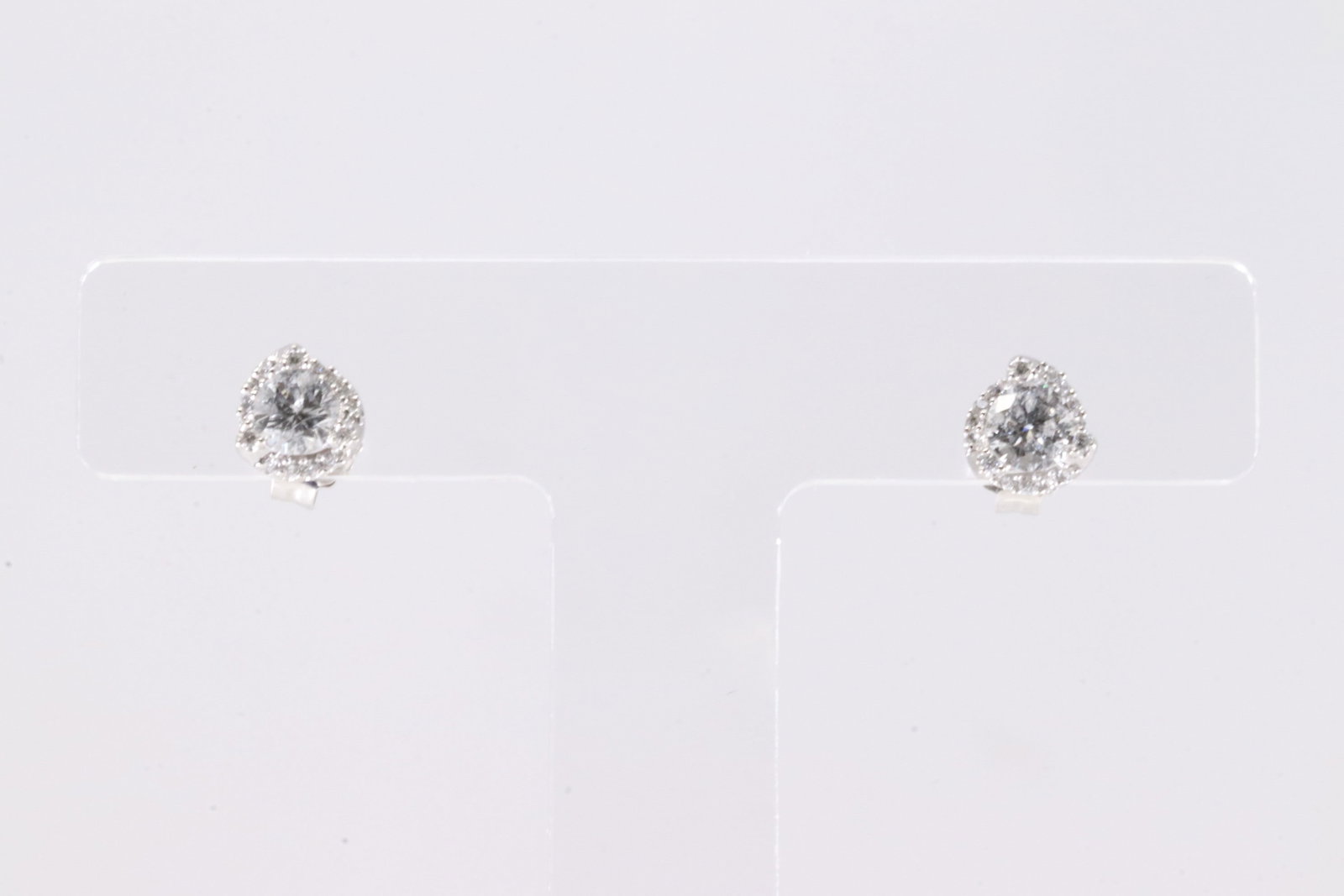Diamond Stud Earring 14Kt.: Ladies 14Kt White Gold Diamond Stud Earring. This Charming Earring's has 32 Round Brilliant Diamonds.