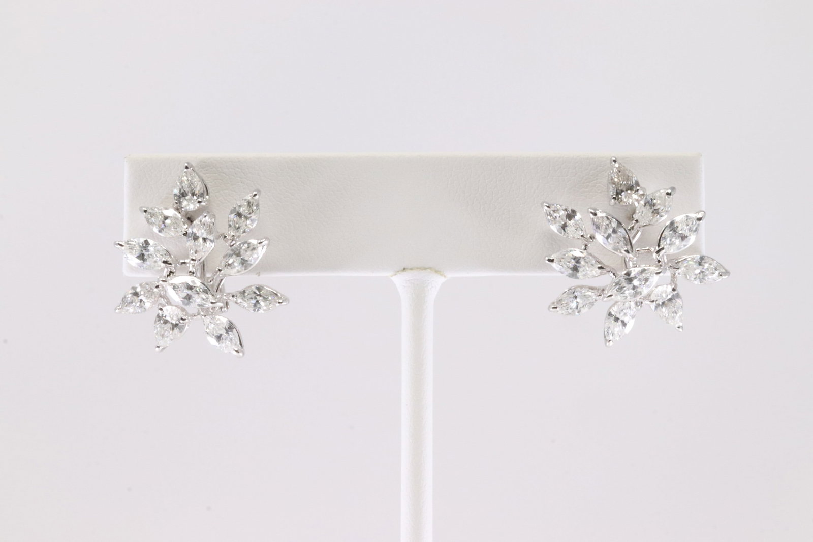 Diamond French Clip Earring 18KT.: Ladies 18Kt White Gold Diamond French Clip Earring. This Earring has Gorgeous Design With 22 Sparkling Diamonds. Diamond Approx Weight: 2.50 ctw Total Weight: 9.00 Grams.