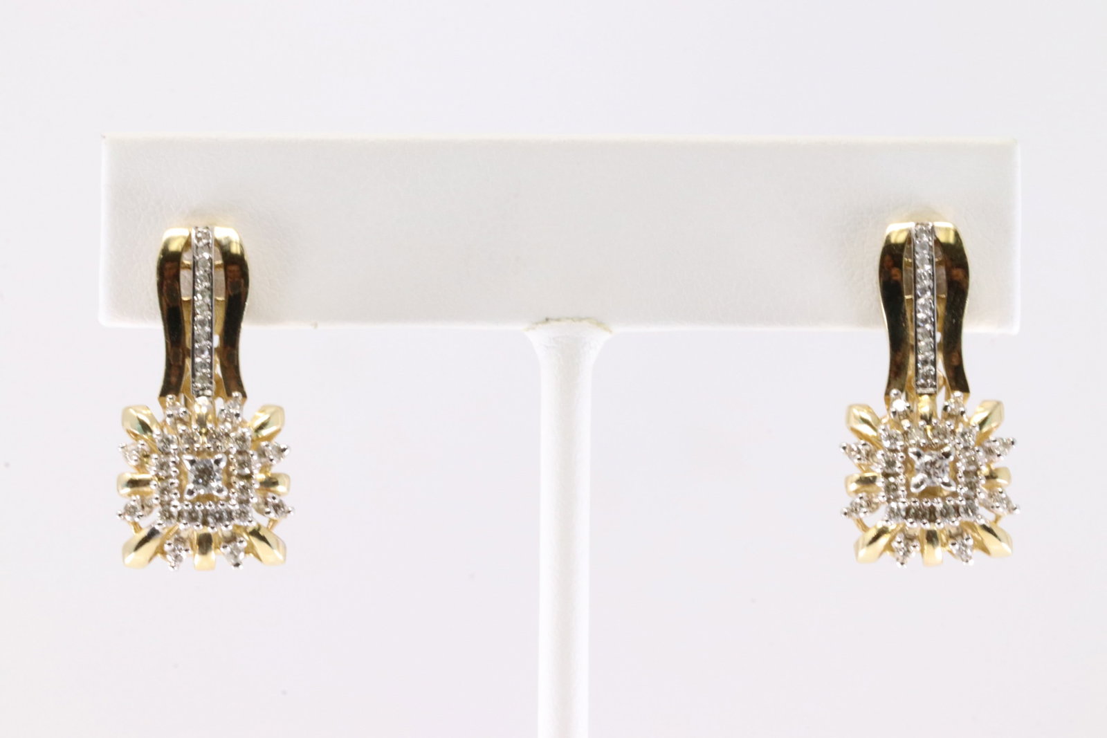 Diamond French Hoop Earring 14Kt.: Ladies 14Kt Yellow Gold Diamond French Hoop Earring. This Elegant French Hoop Earring's has Brilliants Diamonds. Diamonds weight approx: 0.50 ctw Total weight: 7.82 Grams.