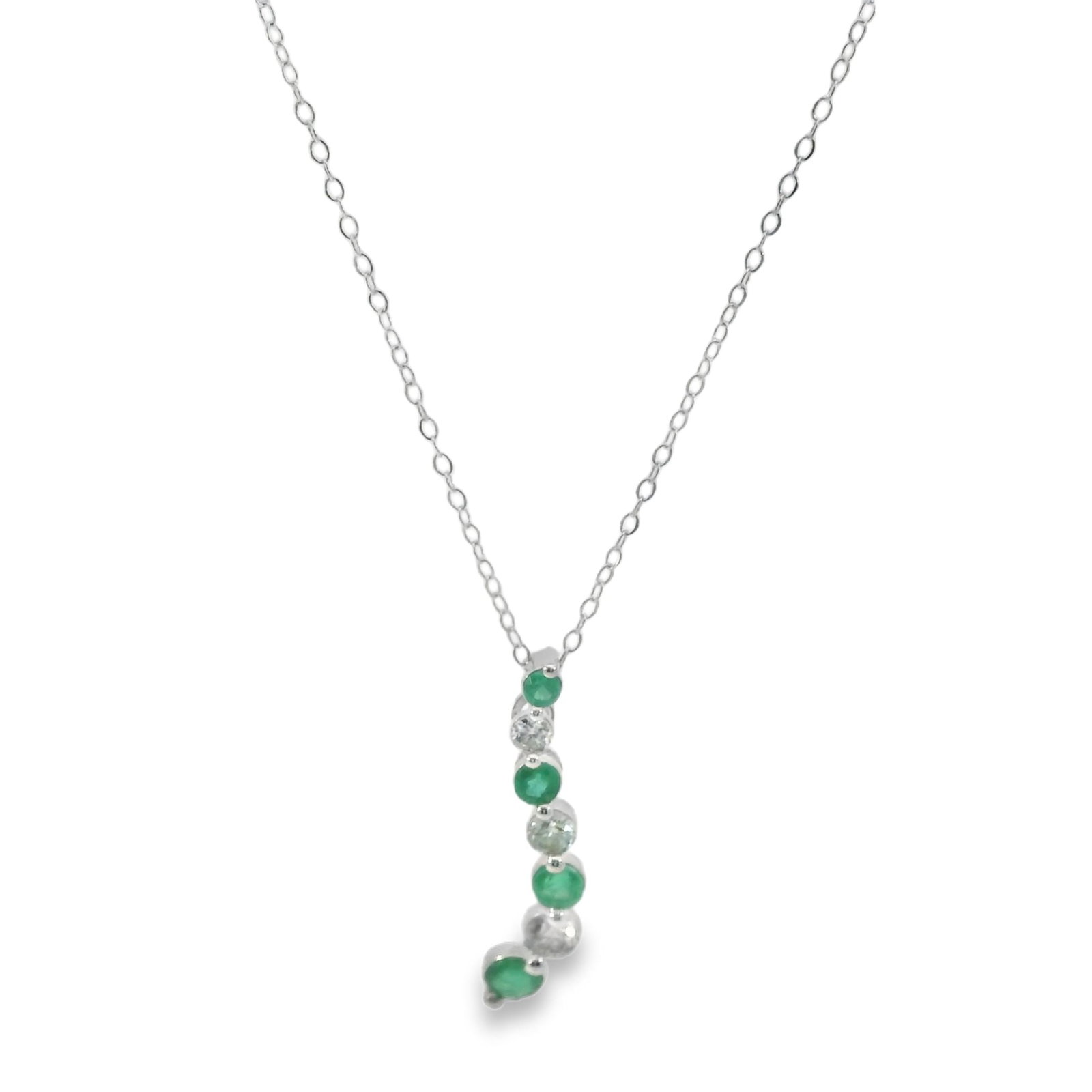 Emerald & Diamond Pendant / Necklace 14Kt.: Ladies 14Kt White Gold Emerald & Diamond Pendant / Necklace. Pendant features a delicate chain adorned with a series of Green Emerald's with 3 Brilliants Diamonds. The minimalist design ensures it com