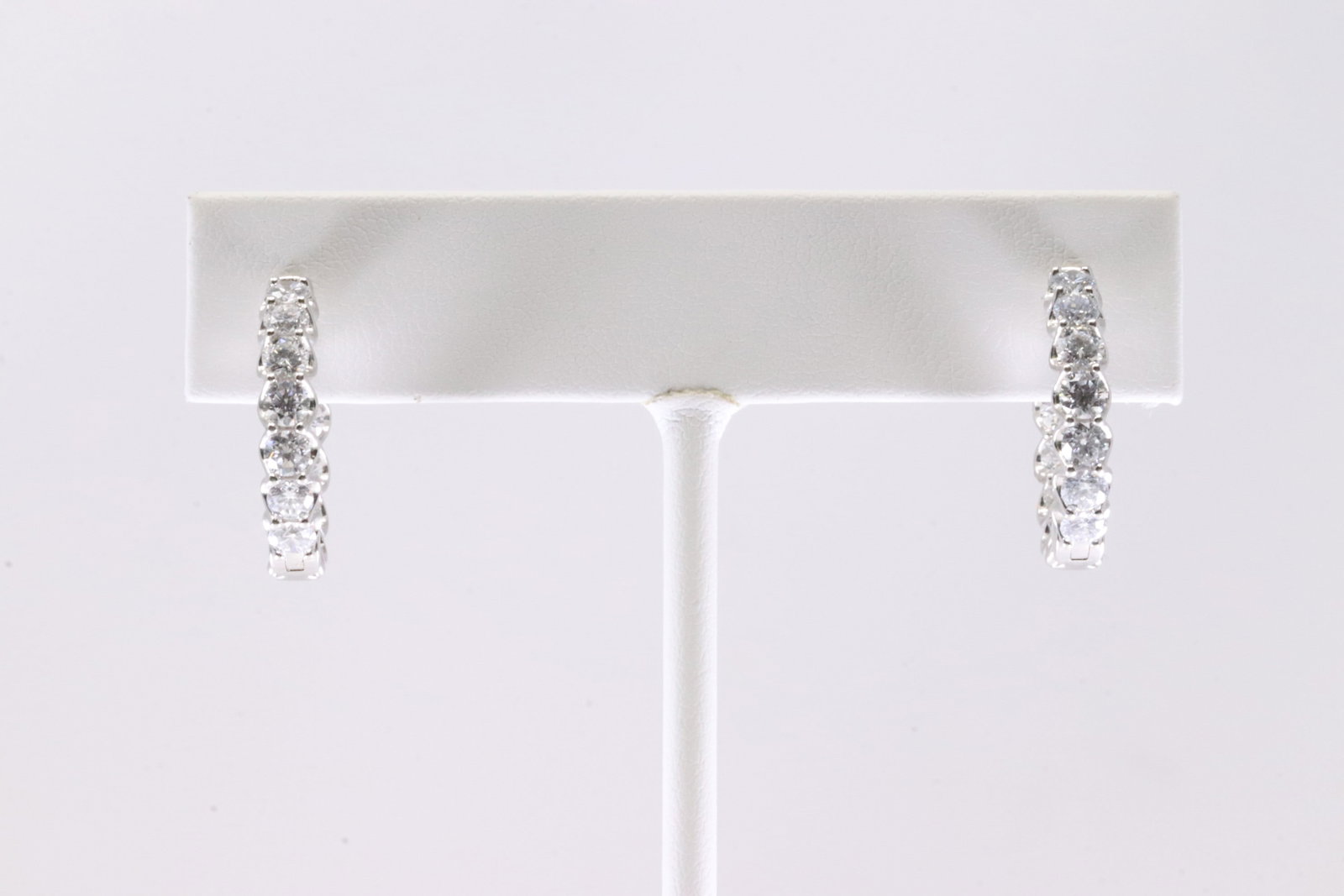 Diamond Hoop Earring 14Kt.: Ladies 14Kt White Gold Diamond Hoop Earring. This Earring has Gorgeous Lab Grown Round Diamonds. Diamond Approx Weight: 2.5 ctw Total Weight: 7.28 Grams.