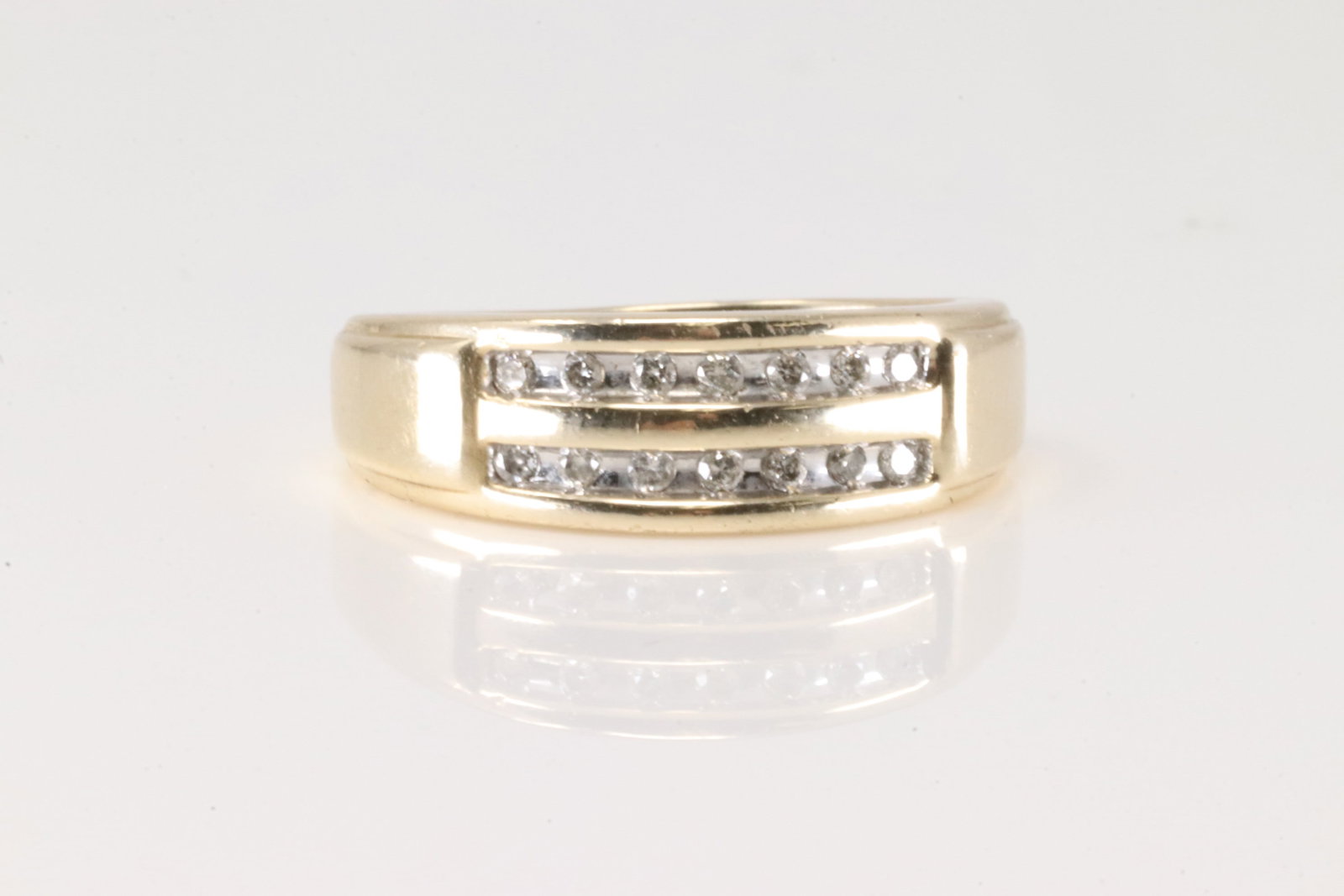 Wedding Diamond Ring 10Kt.: 10Kt Yellow Gold Wedding Diamond Ring. This band ring has 2 rows with 14 round diamonds. Ring size: 8.50. Total weight: 5.00 Grams.