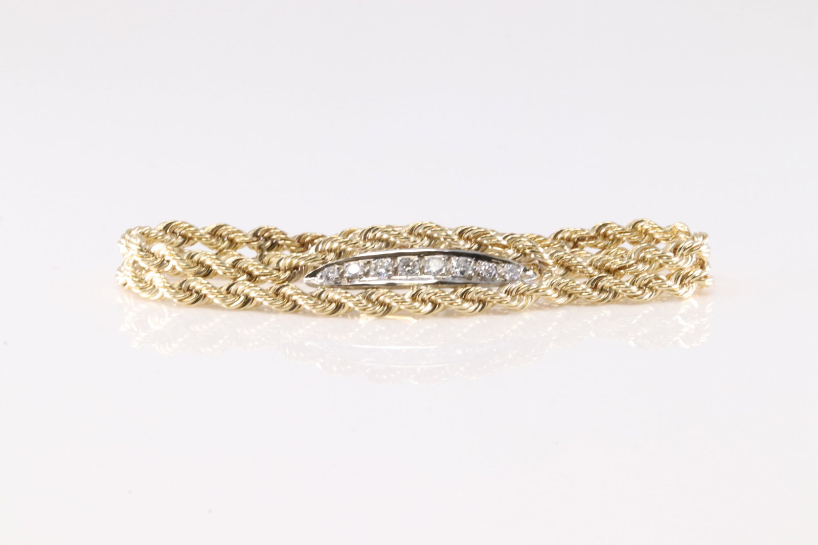 Diamond Bracelet 14Kt.: Ladies 14Kt Yellow Gold Diamond Bracelet. This Elegant Bracelet has 2 Tone Gold with 8 Brilliants Diamonds. Diamonds weight approx: 0.20 ctw Bracelet length: 6.00" Total weight: 9.18 Grams.