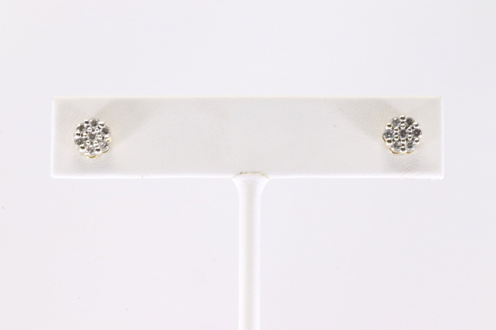 Diamond Stud Earring 10Kt.: Ladies 10Kt Yellow Gold Diamond Stud Earring. This Charming Stud Earring's has Sparkling Diamonds.