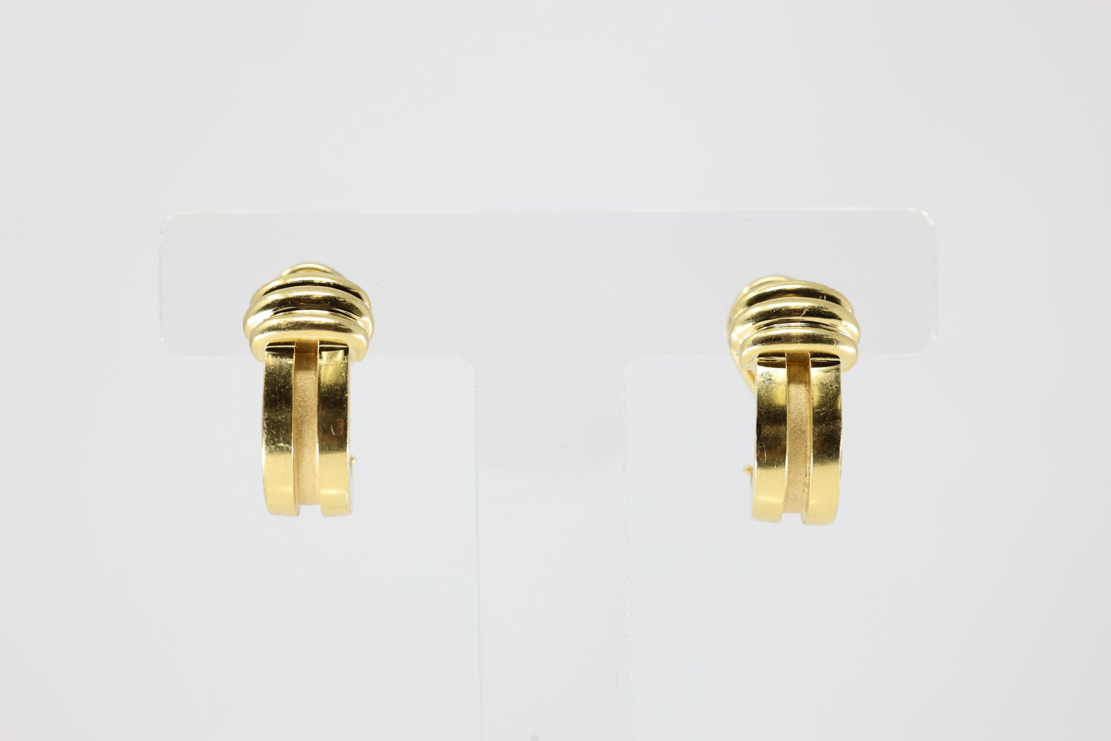 18K Yellow Gold Tiffany & Co. Earrings Circa 1995: This is a vintage earrings by Tiffany & Co., crafted in solid 18K yellow gold and dating to circa 1995. These earrings showcase Tiffany?s timeless design aesthetic and exceptional craftsmanship,
