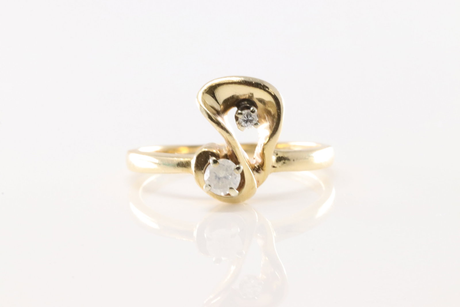 Diamond Ring 14Kt.: Ladies 14kt Yellow Gold Diamond Ring. This Elegant Ring Has 2 Sparkling Diamonds. Ring Size: 6.00. Diamond Total Weight: 2.60 Grams.