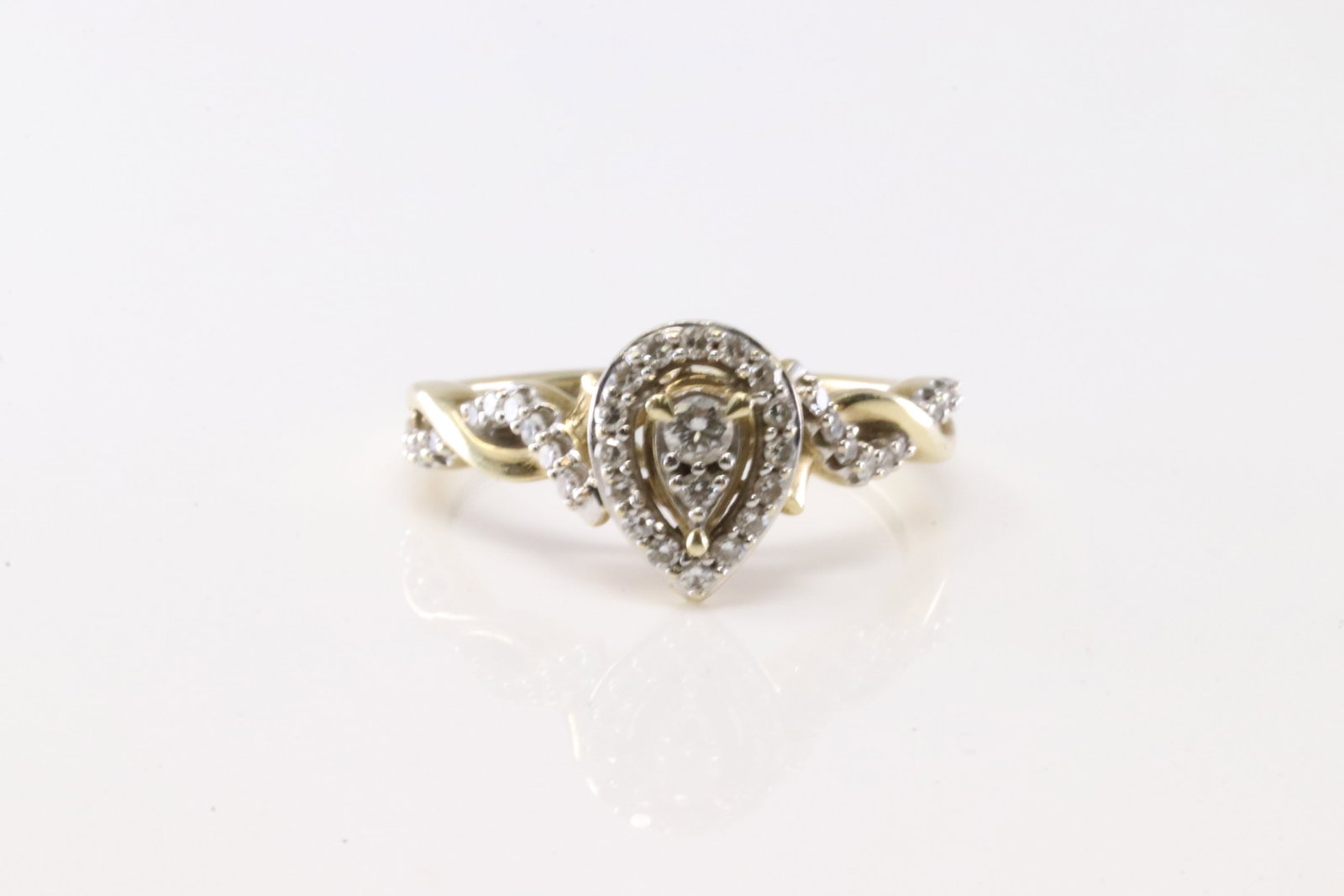 Diamond Ring 10Kt.: Ladies 10Kt Yellow Gold Diamond Ring. This Charming Ring has Pear-Shape Design with Sparkling Diamonds. Diamonds weight approx: 0.35ctw. Ring size: 7.00. Total weight: 2.72 Grams.