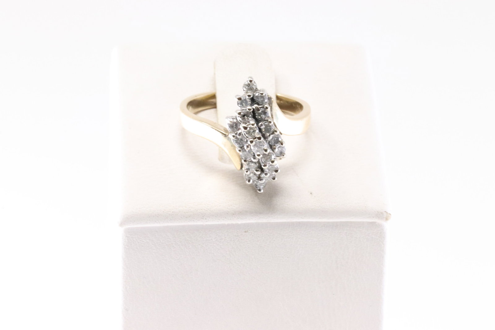 Diamond Ring 10Kt.: Ladies 10Kt Yellow Gold Diamond Ring. This Charming Ring has 19 Round Sparkling Diamonds. Diamond Approx Weight: 0.50CTW. Ring Size: 6.50. Total Weight: 3.63 Grams.