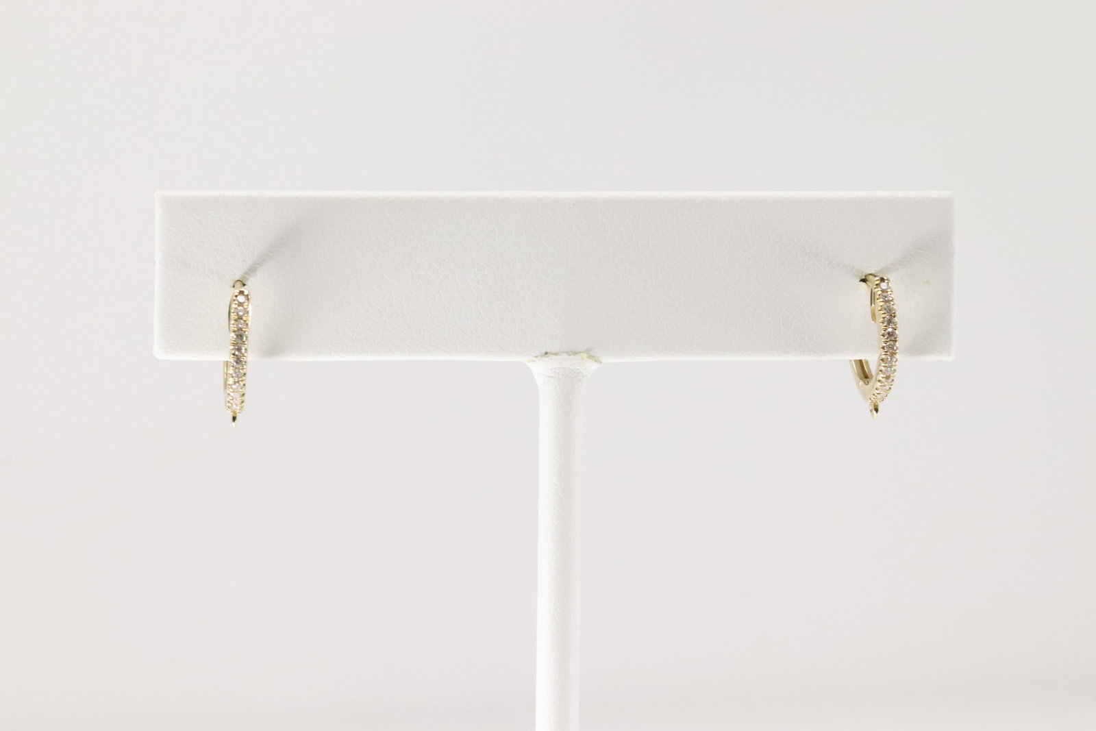 Diamond Hoop Earring 14kt.: Ladies 14kt Yellow Gold Diamond Hoop Earring. Beautiful Earring's With 24 Round Sparkling Diamonds. Diamond Weight: 0.10ct.