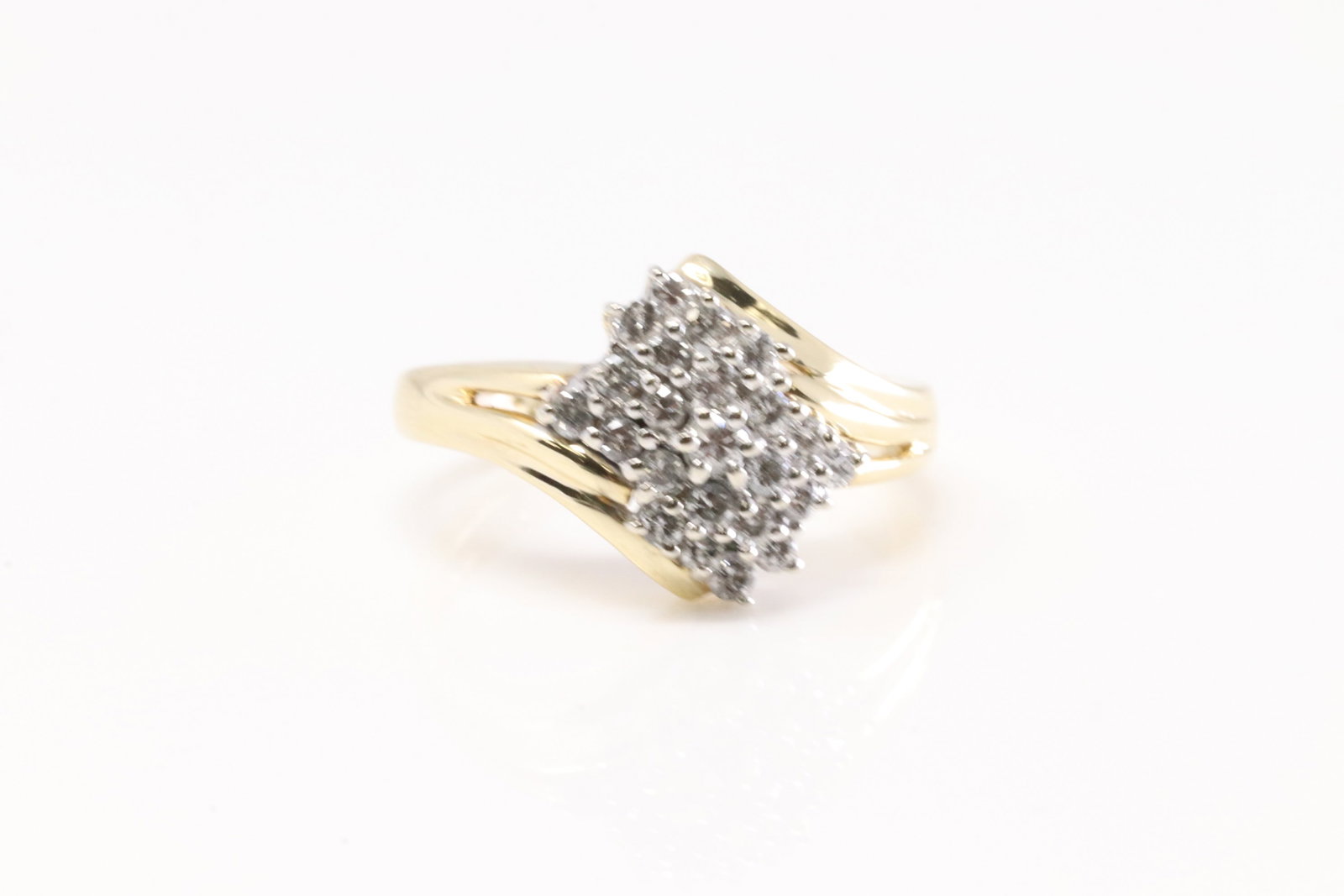 Diamond Ring 14Kt.: Ladies 14Kt Yellow Gold Diamond Ring. This Charming Ring has 23 Round Sparkling Diamonds. Diamond Approx Weight: 0.55CTW.Ring Size: 7.00. Total Weight: 5.10 Grams.
