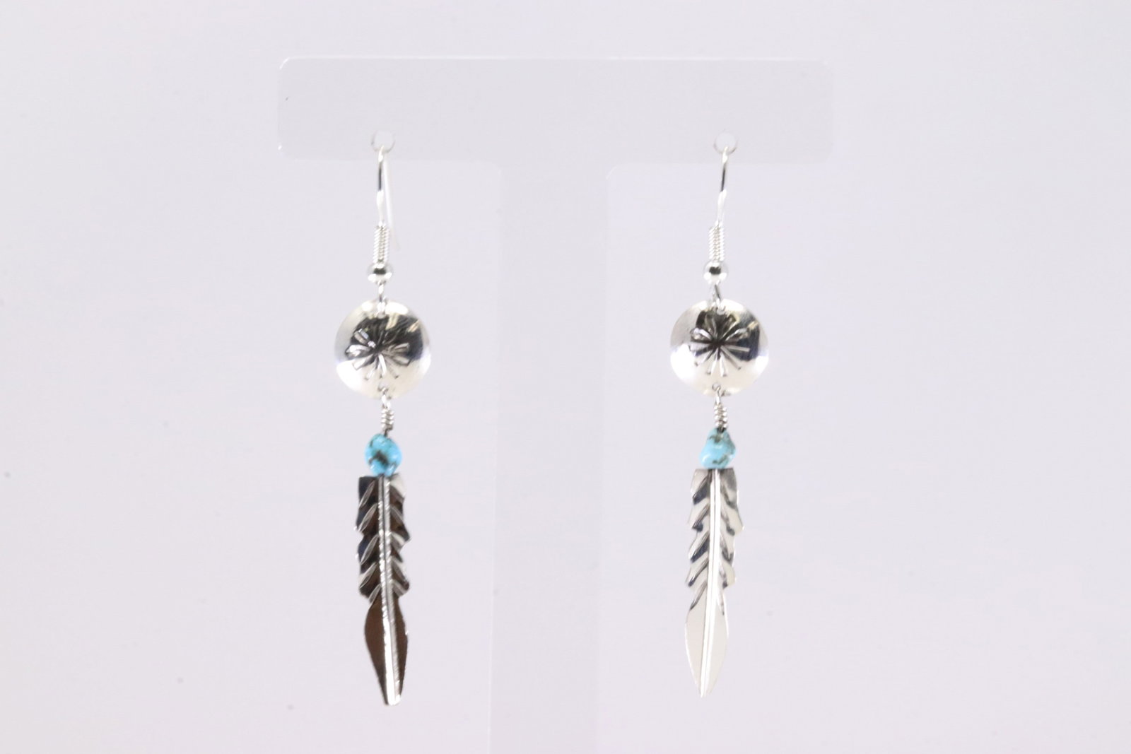 America Sterling Silver Turquoise Feather Dangling Earring's.: This is a America Sterling Silver Turquoise Feather Dangling Earring's.
