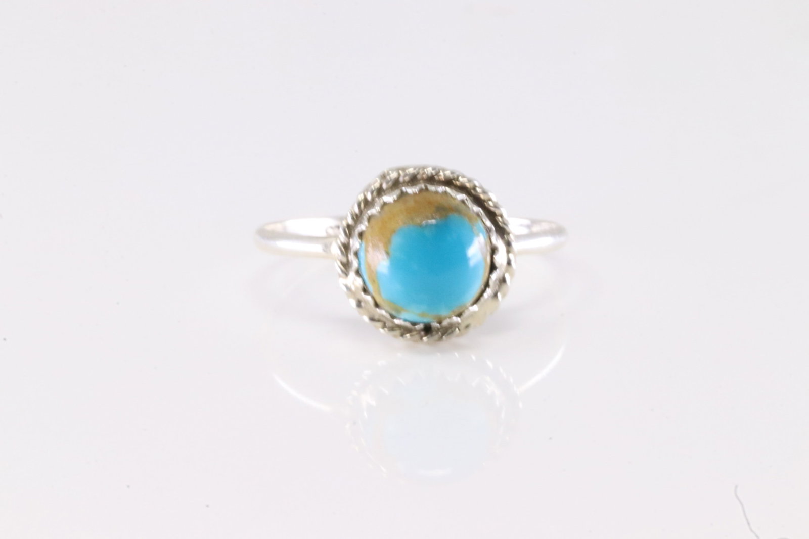 Native America Navajo Sterling Silver Turquoise Ring By Esther White.: This is a Native America Navajo Sterling Silver Turquoise Ring By Esther White. Stamp EW. Ring Size: 8.00.