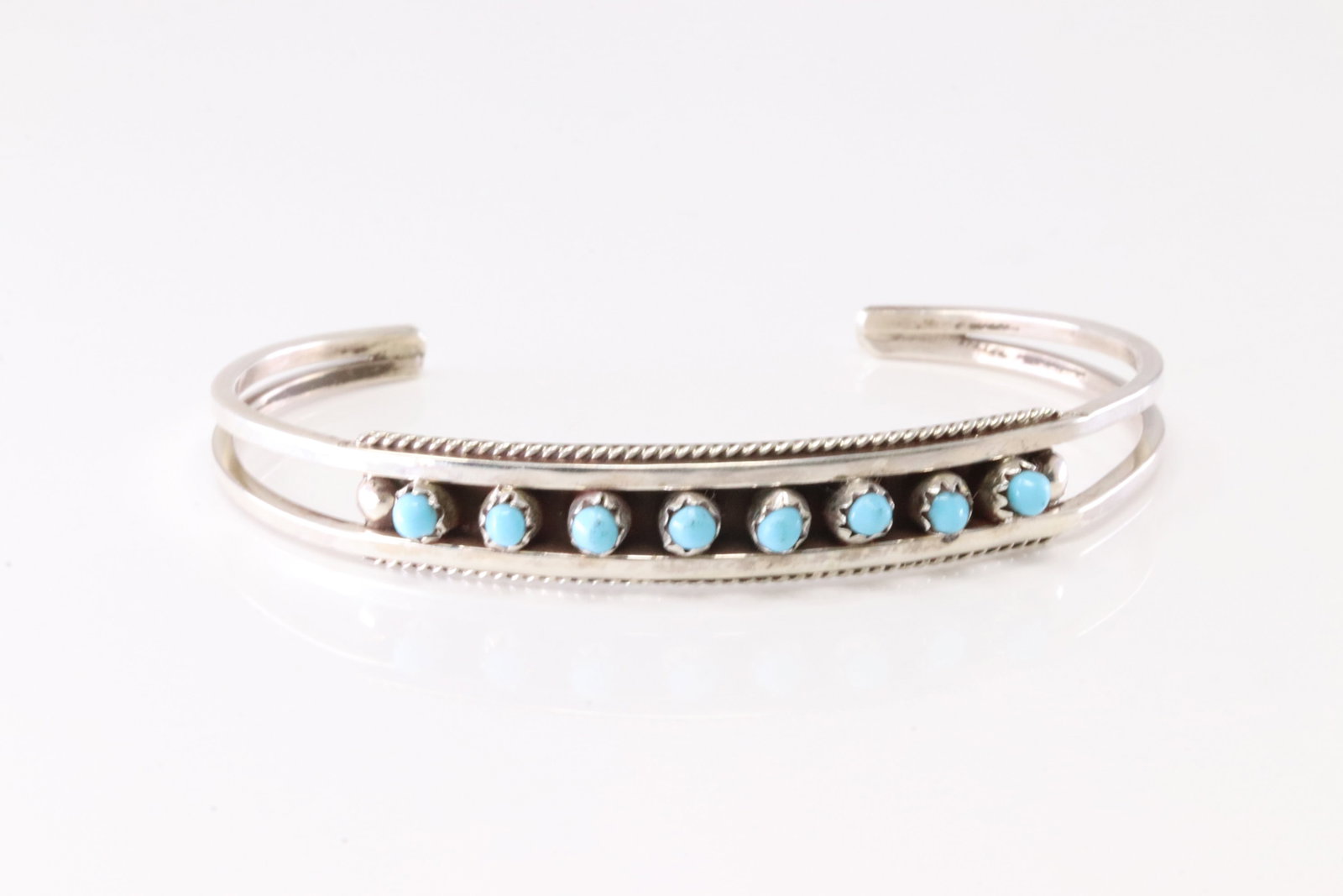 Native America Zuni Sterling Silver Turquoise Bracelet Cuff By SL.: This is a Native America Zuni Sterling Silver Turquoise Bracelet Cuff By SL. Stamp SL.