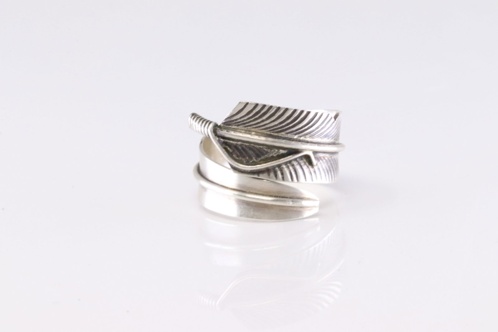 Native America Navajo Sterling Silver Solid Stamped Feather Ring By CC.: This is a Native America Navajo Sterling Silver Solid Stamped Feather Ring By CC. Stamp CC. Ring Size: 8.00.