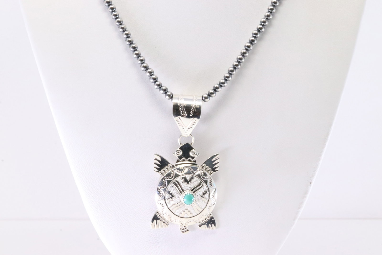 Native America Navajo Sterling Silver Turquoise Turtle Pendant By AL With Machine Made Sterling: This is a Native America Navajo Sterling Silver Turquoise Turtle Pendant By AL With Machine Made Sterling Silver Pearl Beaded Necklace. Stamp AL. Necklace Length: 24.00.