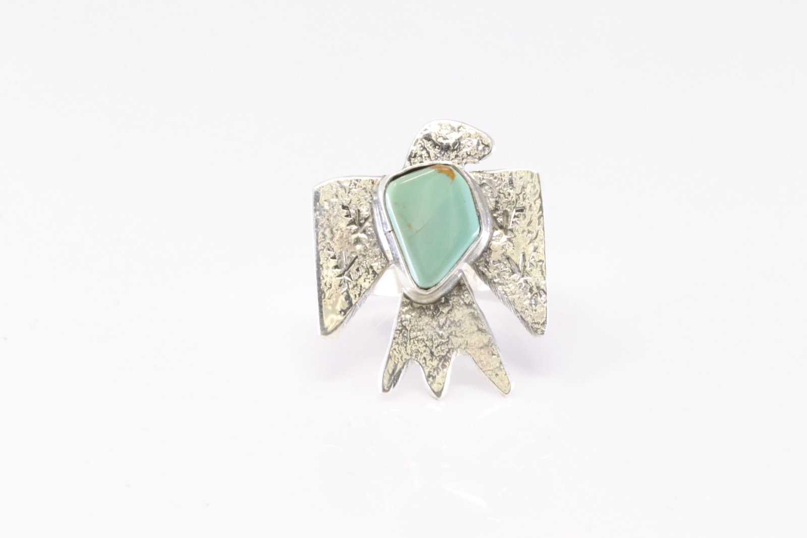 Native America Zuni Sterling Silver Turquoise Thunderbird Ring By Jude Candelaria.: This is a Native America Zuni Sterling Silver Turquoise Thunderbird Ring By Jude Candelaria. Ring size: 7.75.