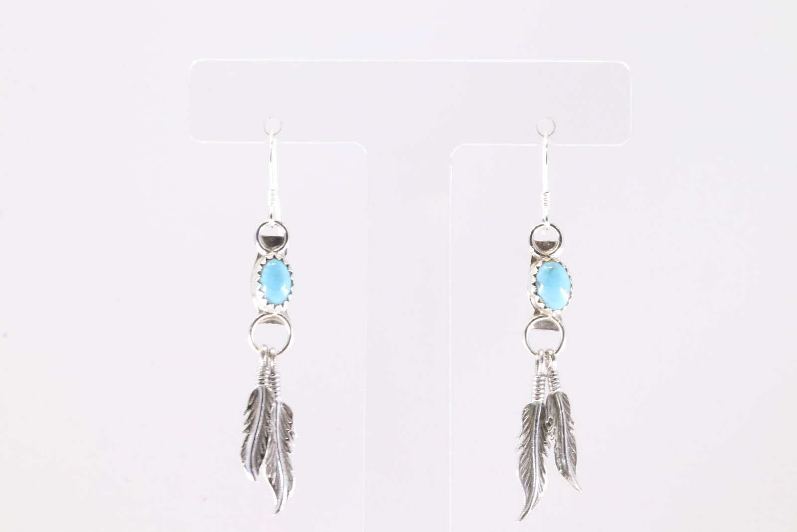 America Sterling Silver Turquoise Feather Dangling Earring's.: This is a America Sterling Silver Turquoise Feather Dangling Earring's.