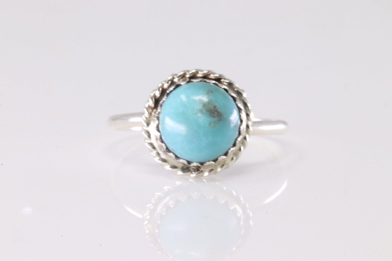 Native America Navajo Sterling Silver Turquoise Ring By Esther White.: This is a Native America Navajo Sterling Silver Turquoise Ring By Esther White. Stamp EW. Ring Size: 6.50.