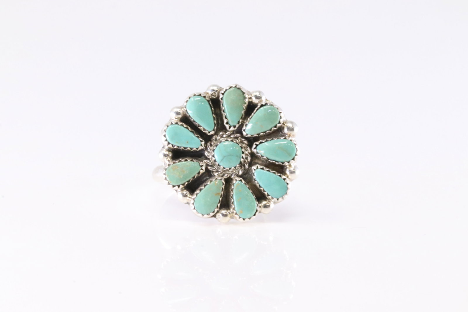 Native America Zuni Sterling Silver Turquoise Ring By AJW.: This is a Native America Zuni Sterling Silver Turquoise Ring By AJW. Stamp AJW. Ring Size: 7.00.