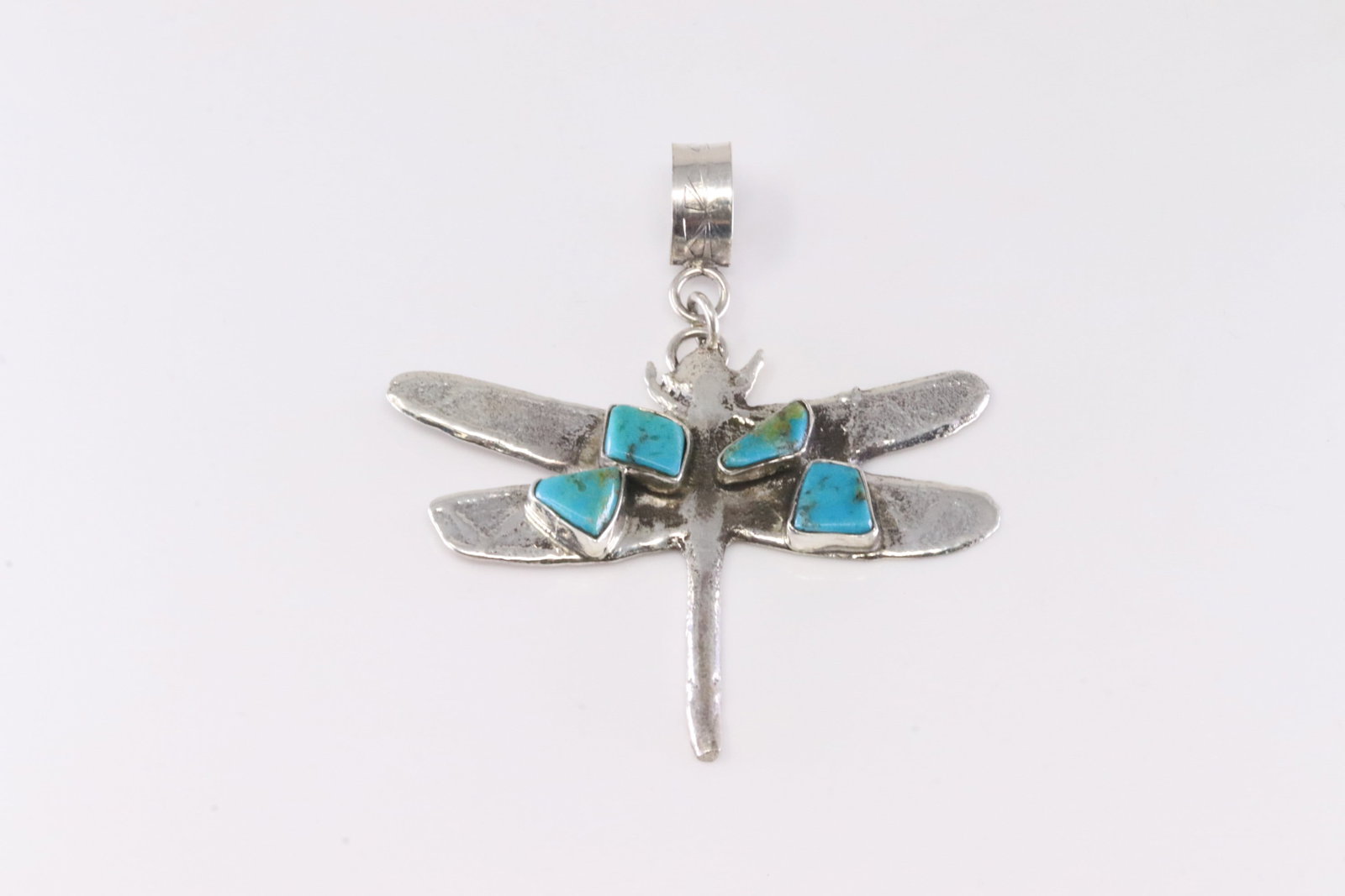 Native America Zuni Sterling Silver Kingman Turquoise Dragonfly Pendant By Jude Candelaria.: This is a Native America Zuni Sterling Silver Kingman Turquoise Dragonfly Pendant By Jude Candelaria. Stamp Jude Candelaria.