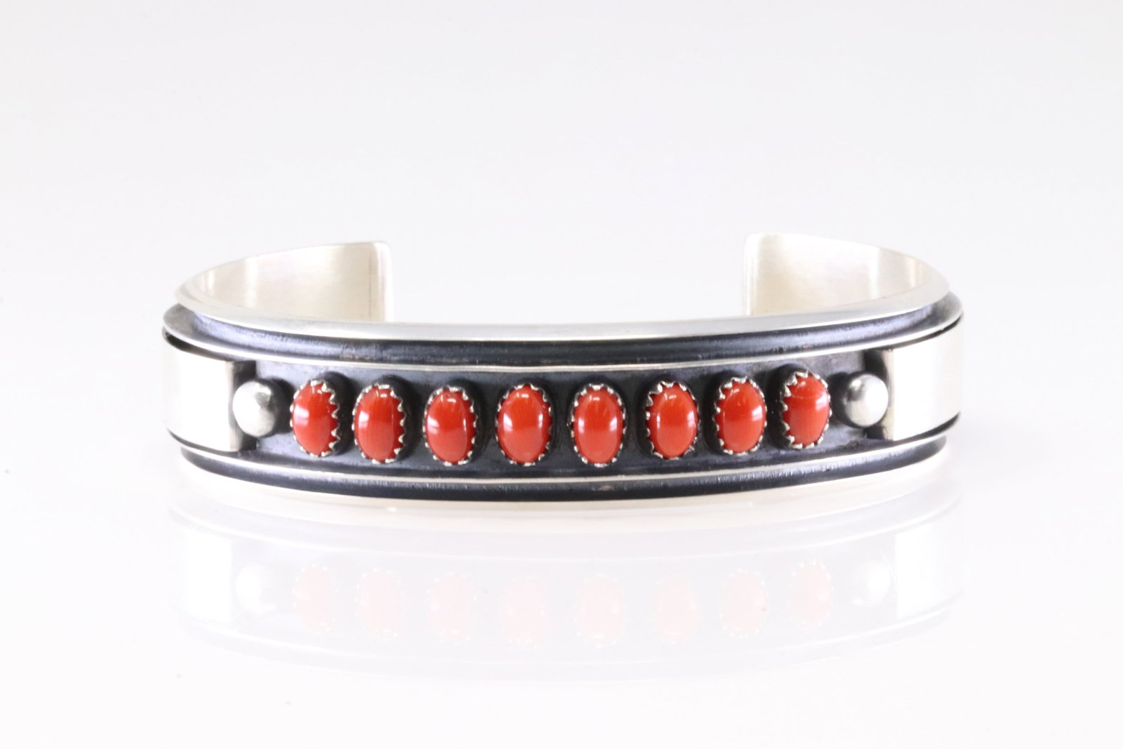 Native America Navajo Sterling Silver Coral Bracelet Cuff By Mary James.: This is a Native America Navajo Sterling Silver Coral Bracelet Cuff By Mary James. Stamp MJ.