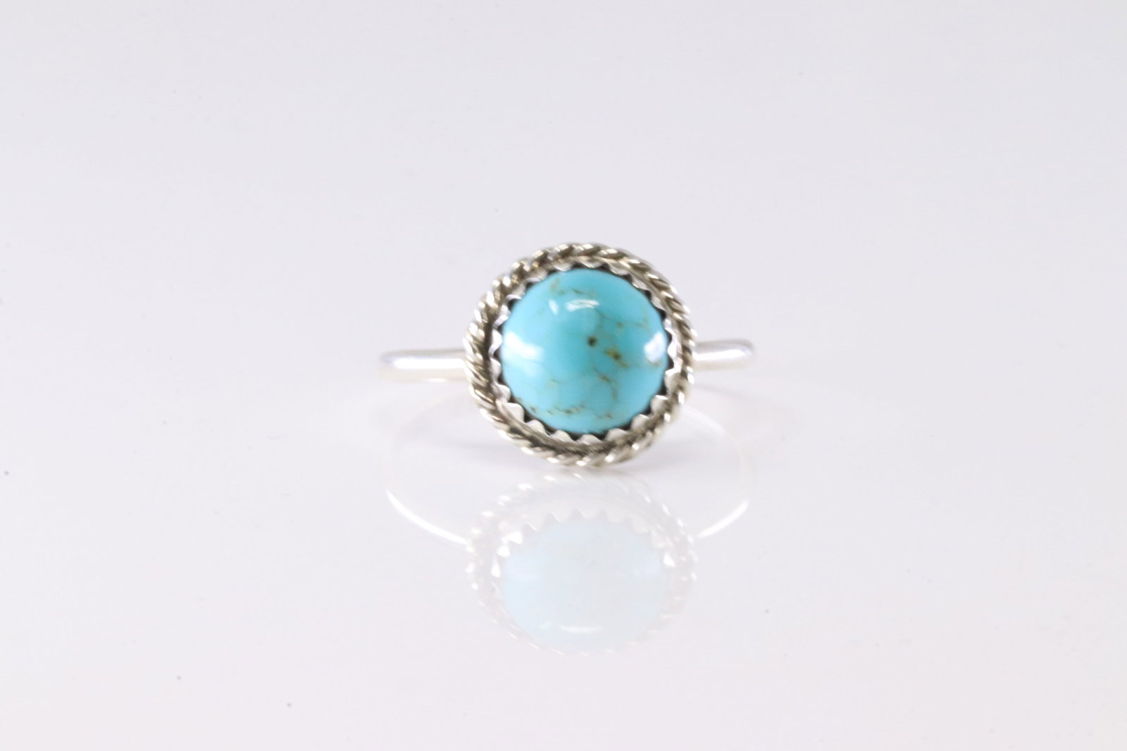Native America Navajo Sterling Silver Turquoise Ring By Esther White.: This is a Native America Navajo Sterling Silver Turquoise Ring By Esther White. Stamp EW. Ring Size: 6.50.