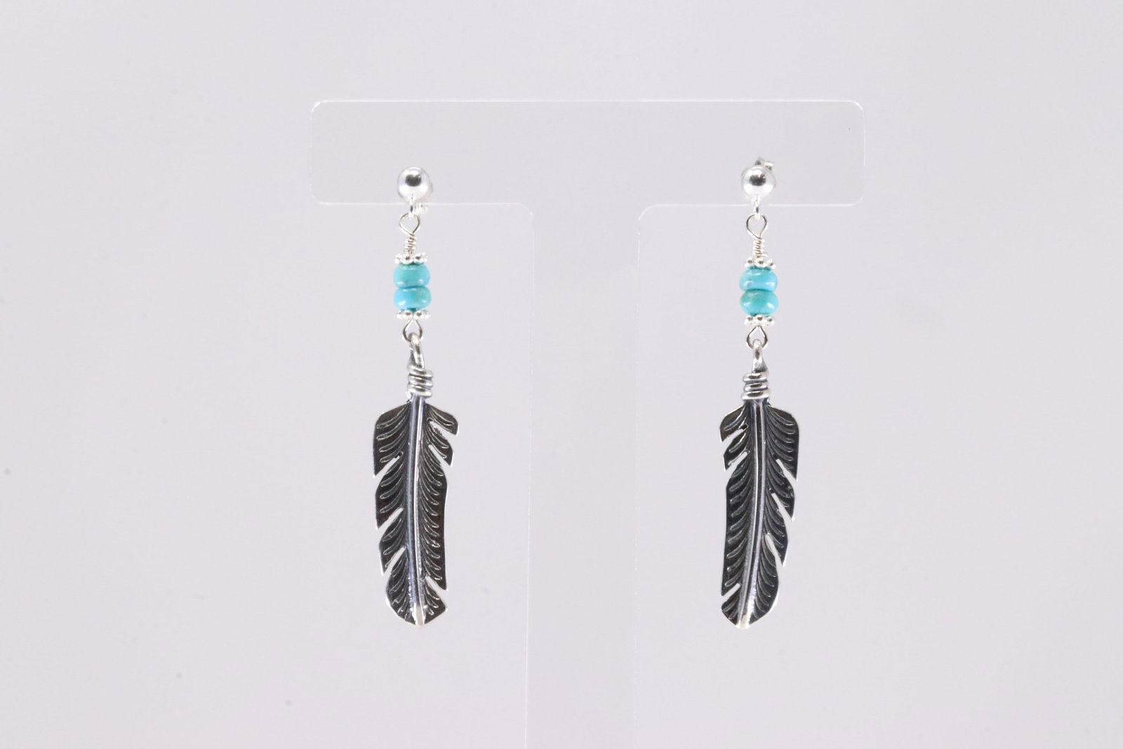 America Sterling Silver Turquoise Feather Post / Dangling Earring's.: This is a America Sterling Silver Turquoise Feather Post / Dangling Earring's.