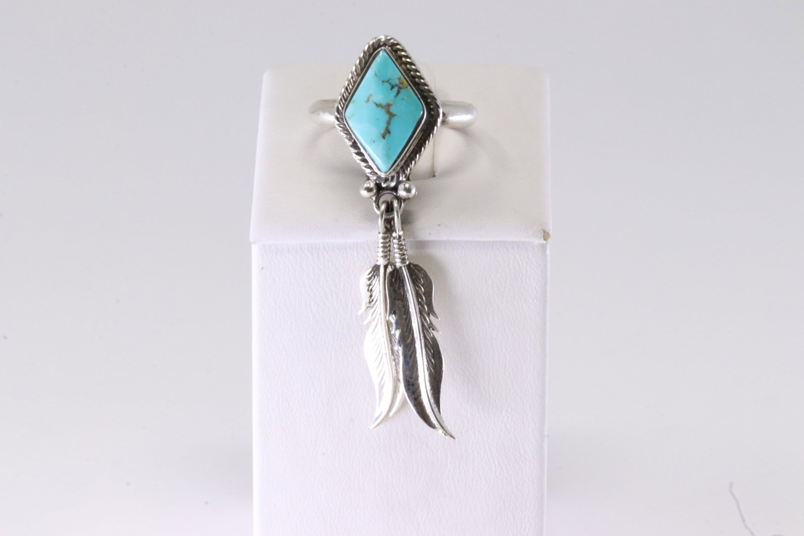 Native America Navajo Sterling Silver Turquoise Feather Ring By Jerome Lee.: This is a Native America Navajo Sterling Silver Turquoise Feather Ring By Jerome Lee. Stamp By R.B Company. Ring Size: 8.75.